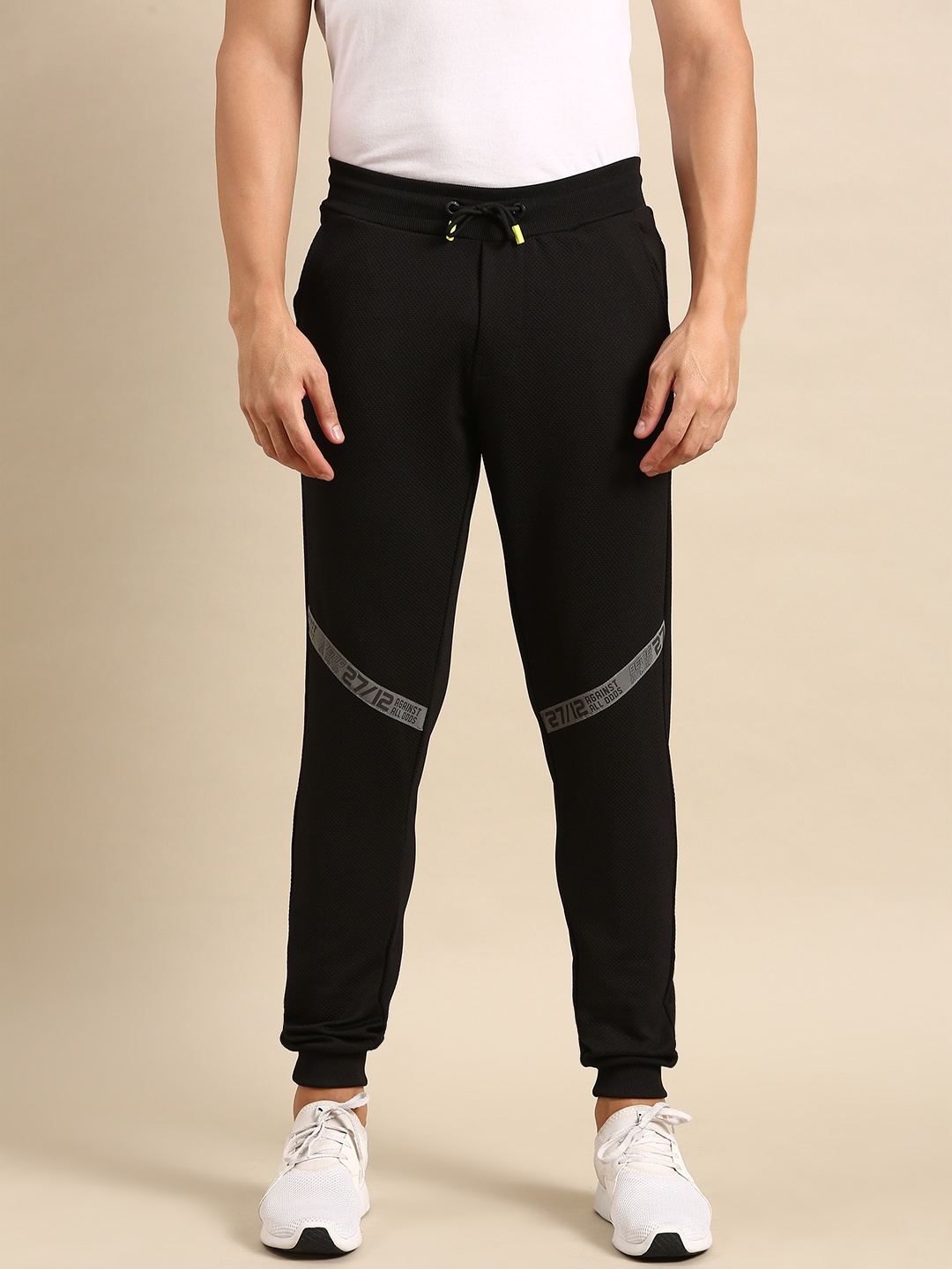 

Being Human Men Mid-Rise Solid Joggers With Taping Detail On Knee, Black