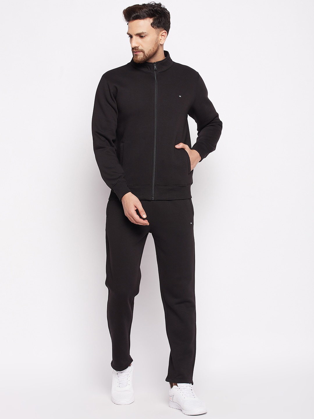 

Okane Men Black Solid Tracksuits