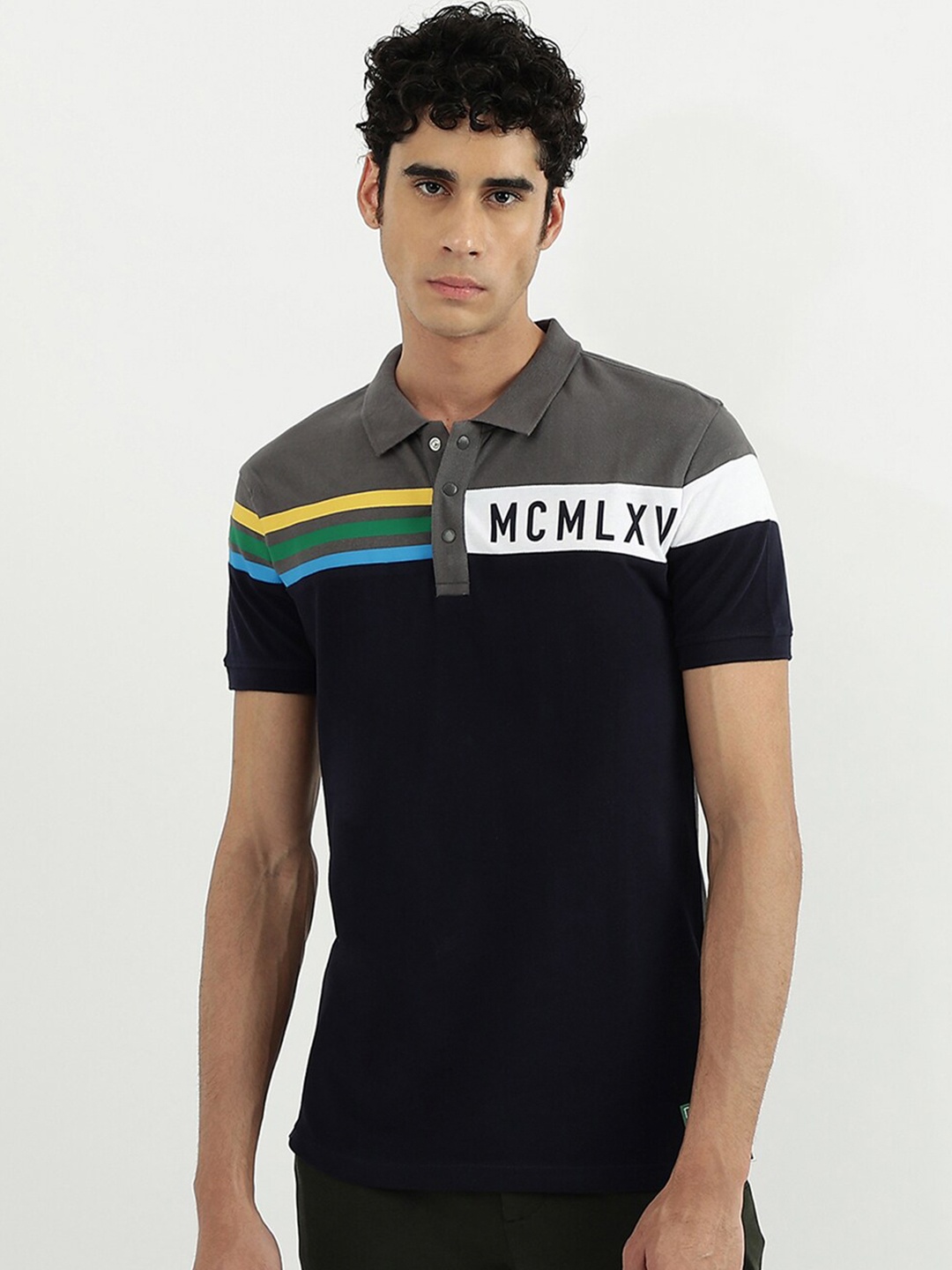 

United Colors of Benetton Men Navy Blue Typography Cotton Polo Collar T-shirt