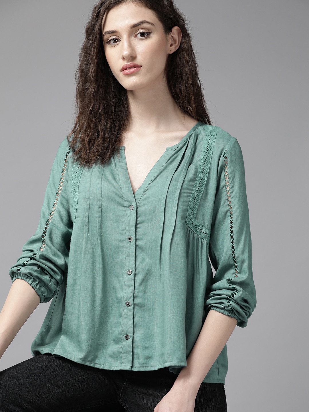 

Roadster Women Teal Solid V-Neck Empire Top
