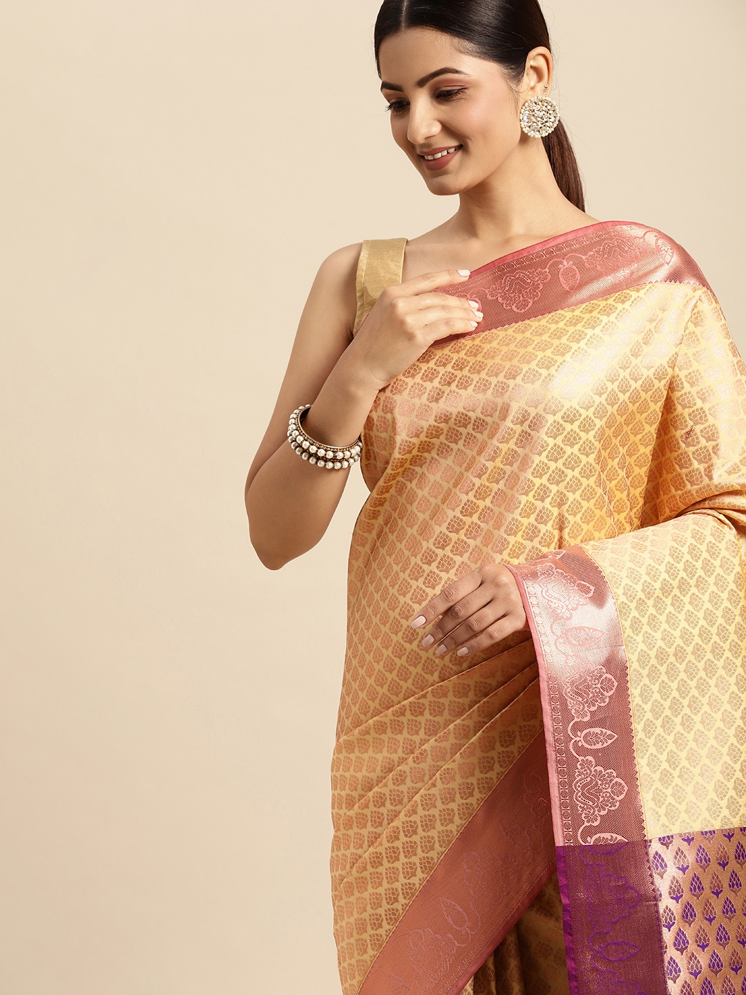 

Pothys Cream-Coloured & Golden Ethnic Motifs Art Silk Saree