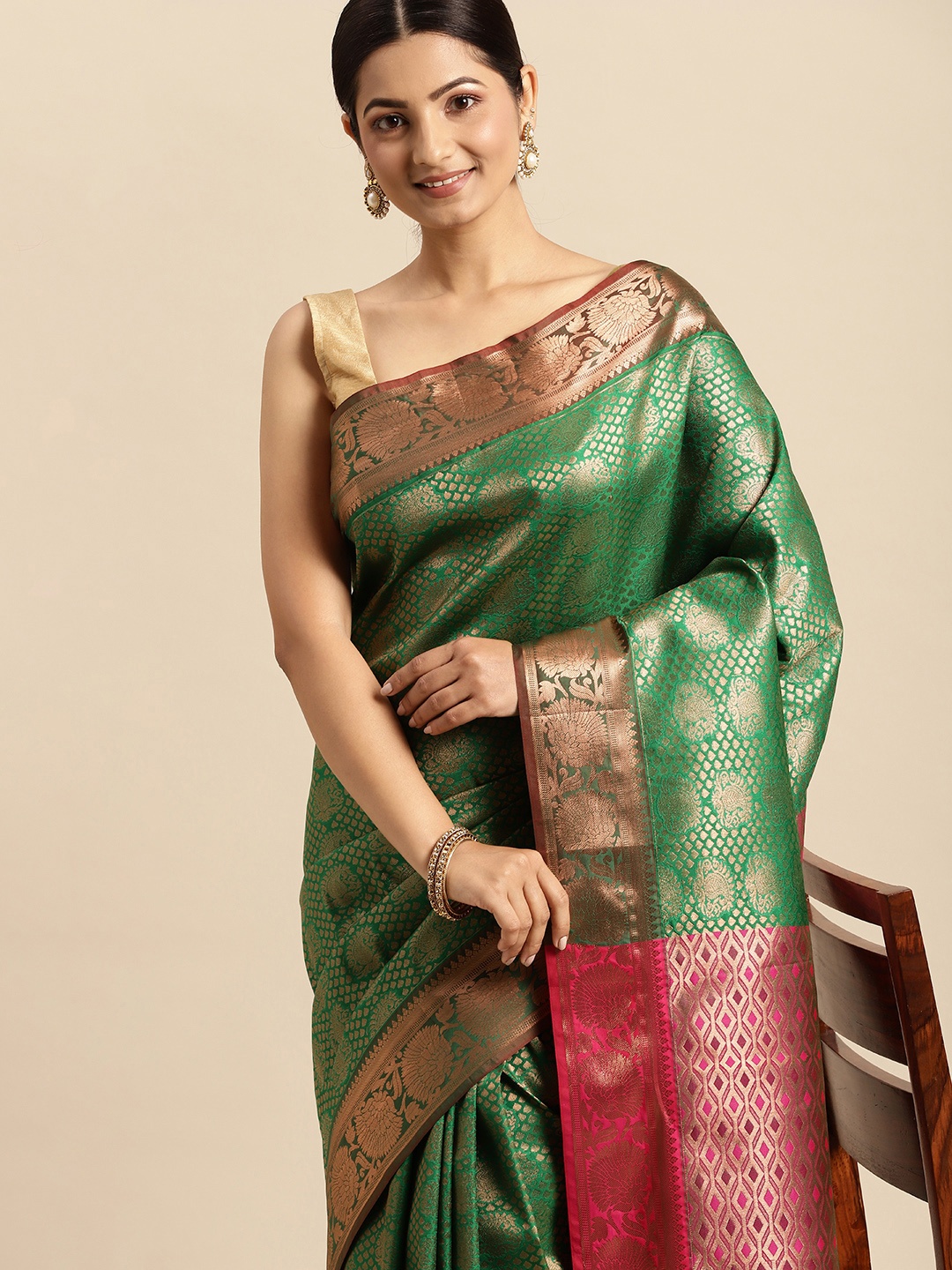 

Pothys Green & Golden Ethnic Motifs Art Silk Saree