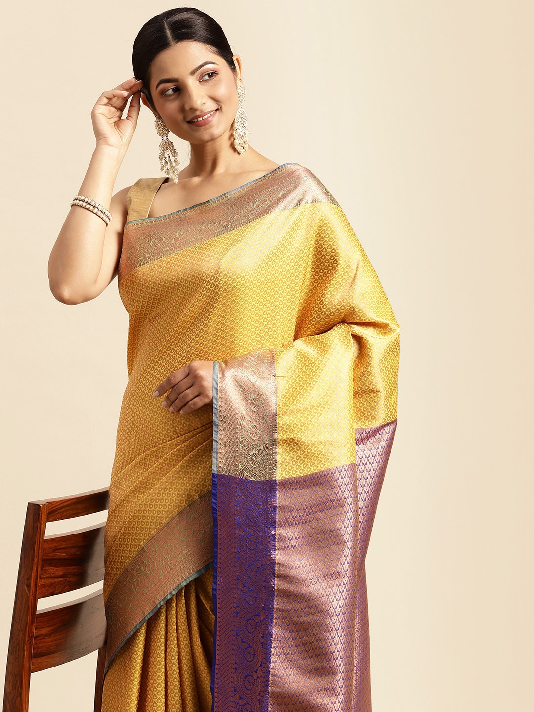 

Pothys Yellow & Golden Ethnic Motifs Art Silk Saree