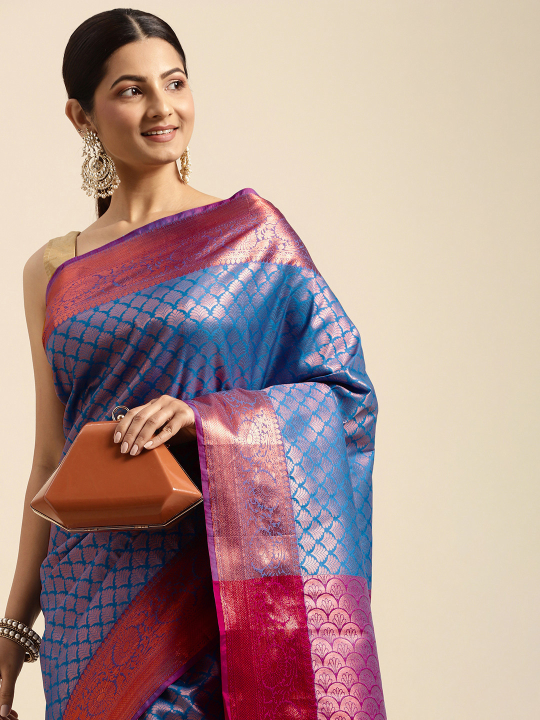 

Pothys Blue & Golden Ethnic Motifs Art Silk Saree