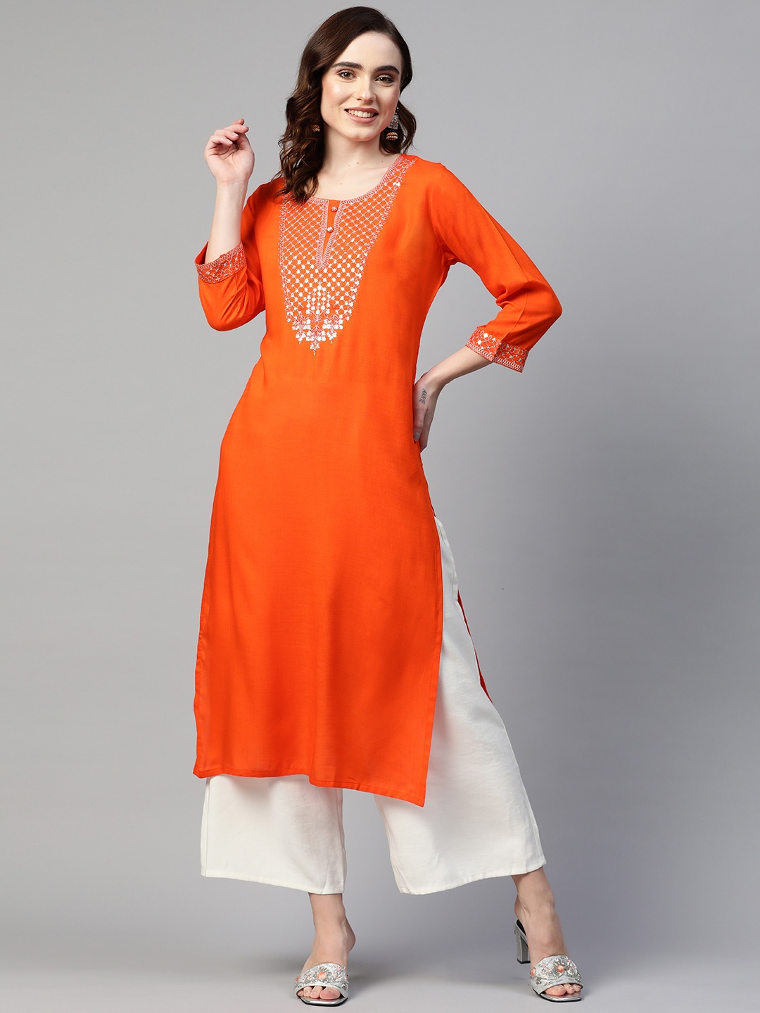 

Readiprint Fashions Women Orange Sequined Yoke Design Kurta