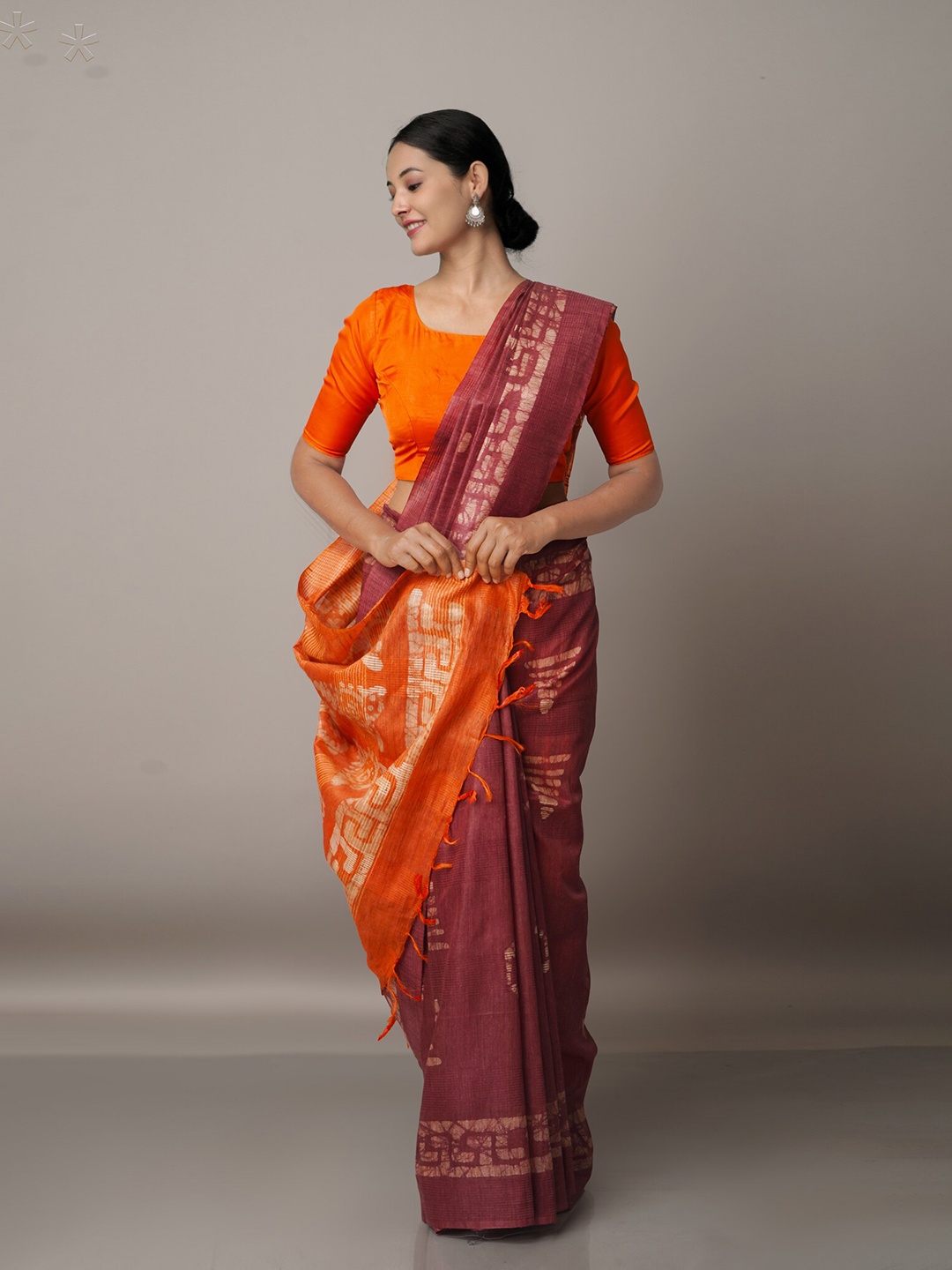 

Unnati Silks Burgundy & Orange Batik Silk Cotton Bhagalpuri Saree