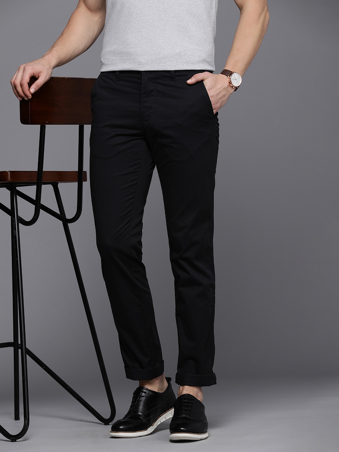 

Louis Philippe Sport Men Solid Slim Fit Mid-Rise Casual Trousers, Black