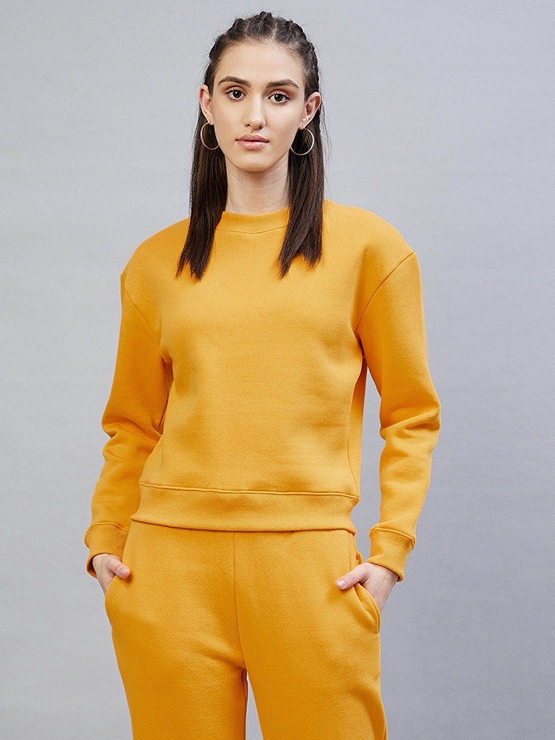 

DELAN Women Yellow Solid Fleece Round Neck Sweatshirt