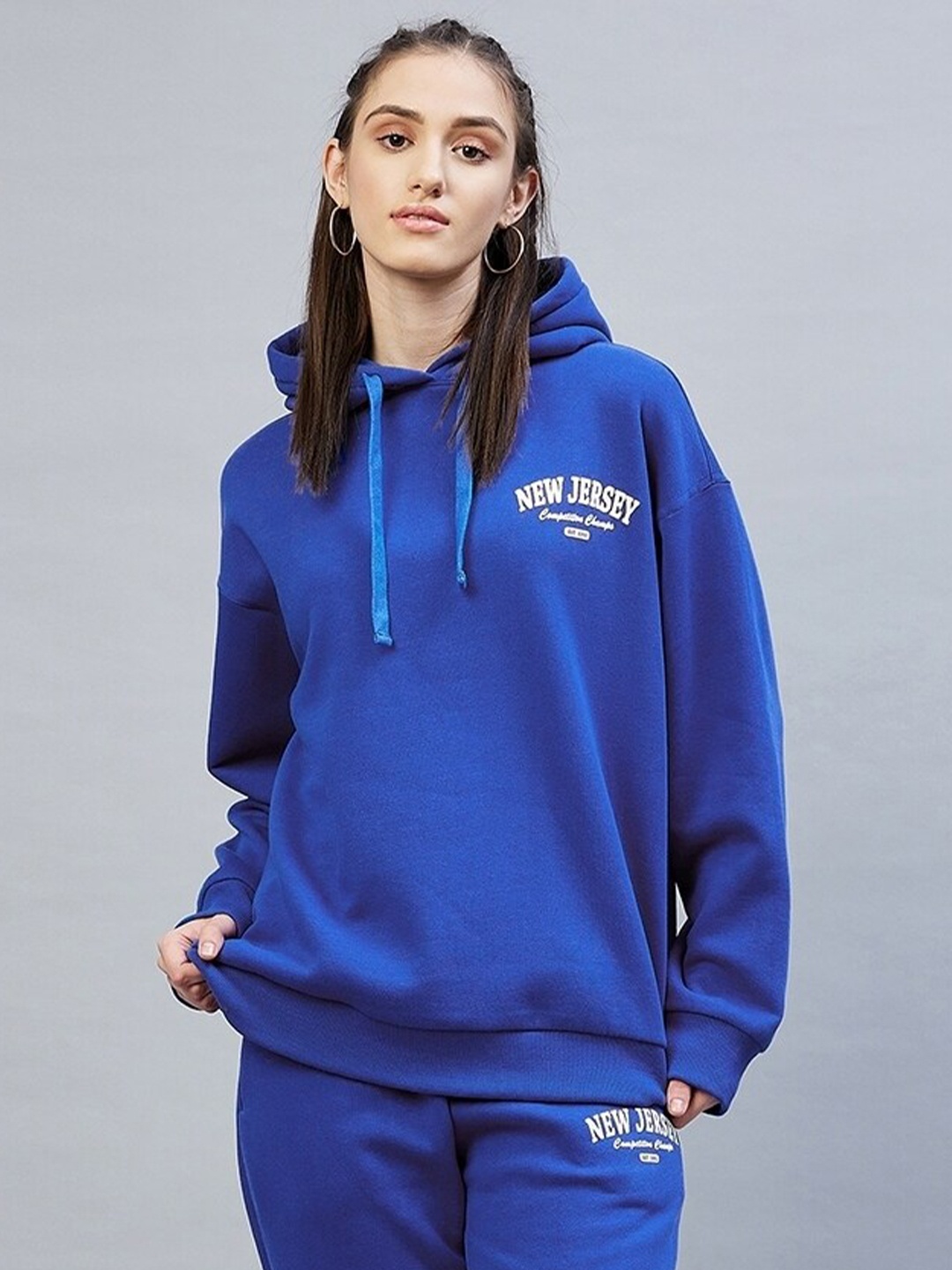 

DELAN Women Blue Solid Fleece Hooded Sweatshirt