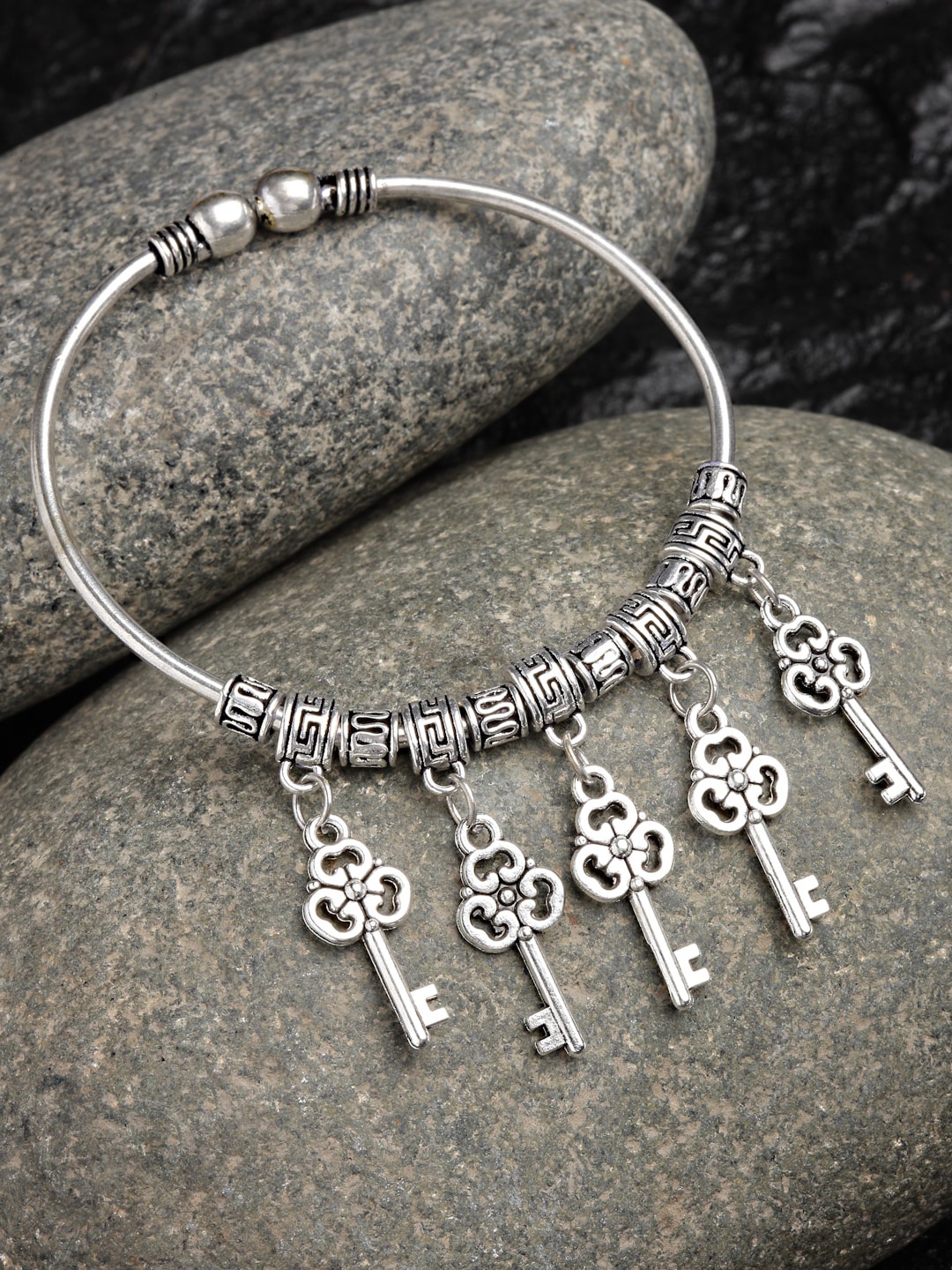 

Sanjog German Silver Oxidised Keychain Charm Adjustable Bangle