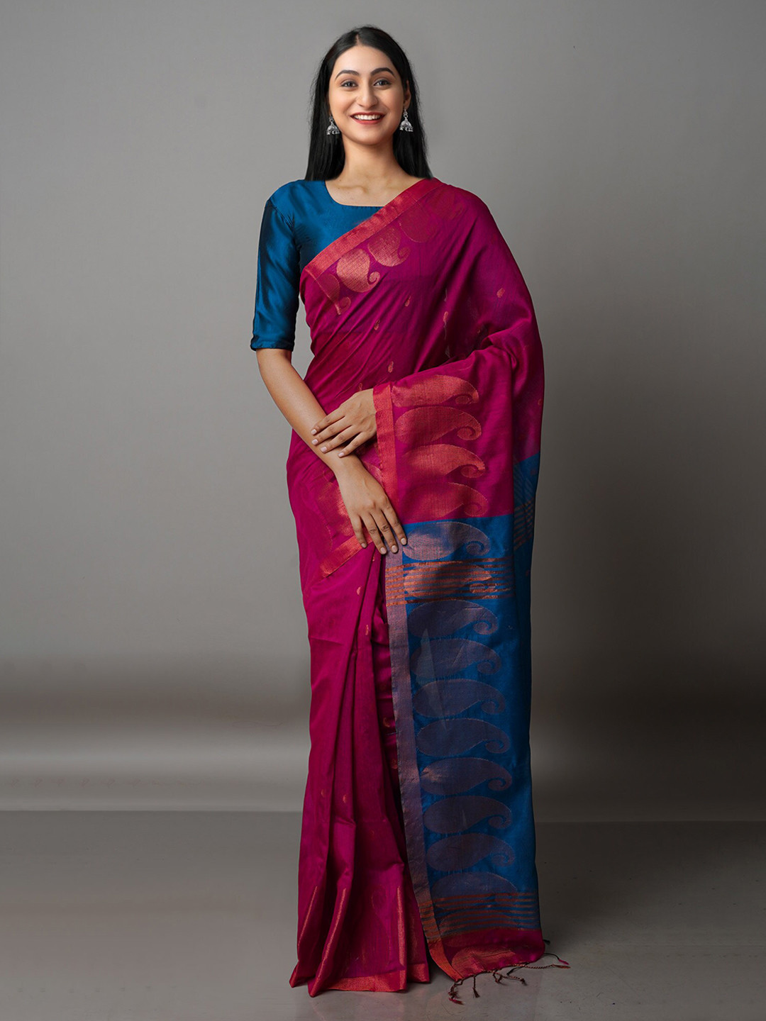 

Unnati Silks Pink & Blue Ethnic Motifs Zari Silk Cotton Jamdani Saree