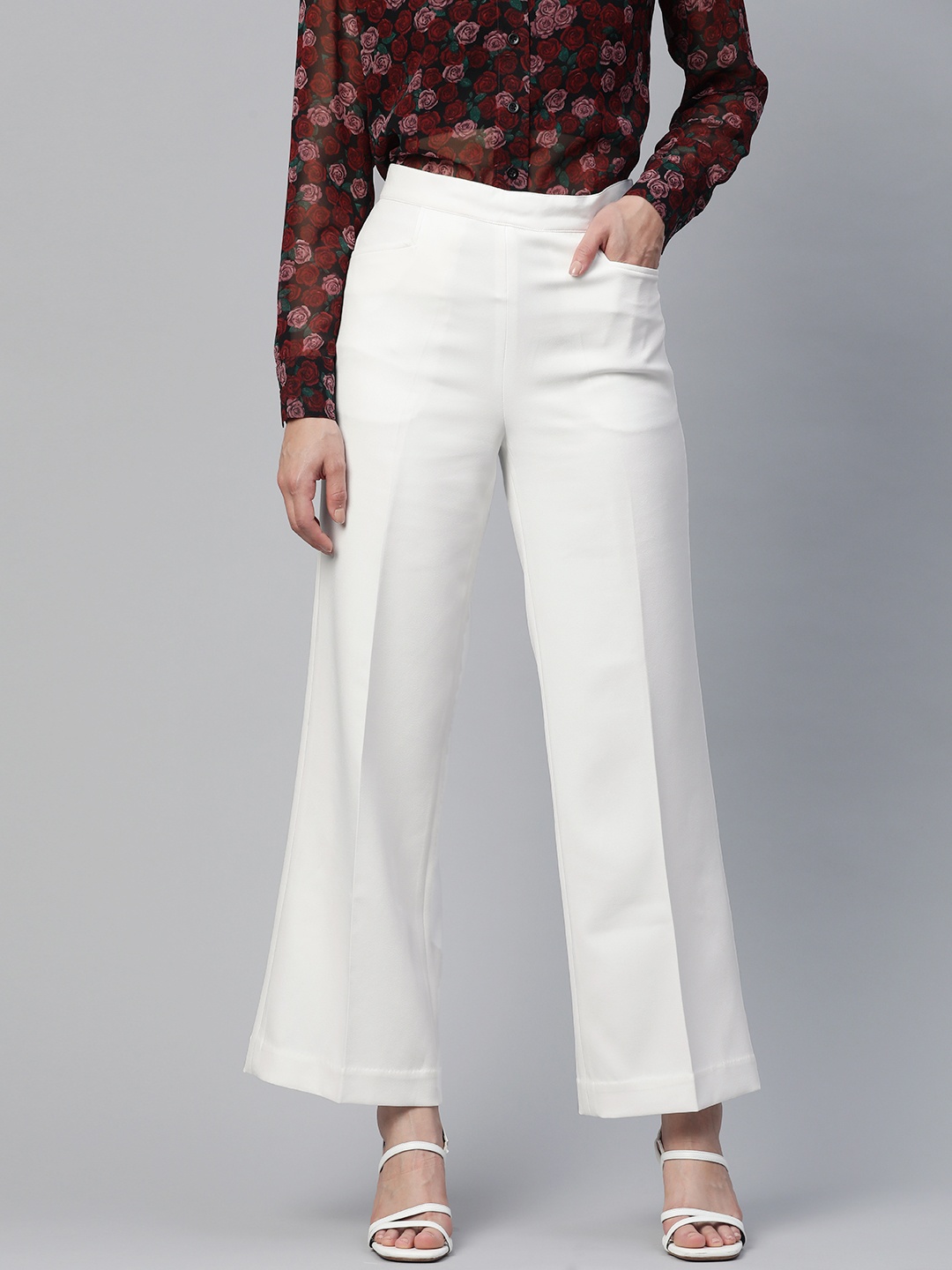 

PowerSutra Women White Flared Solid Trousers