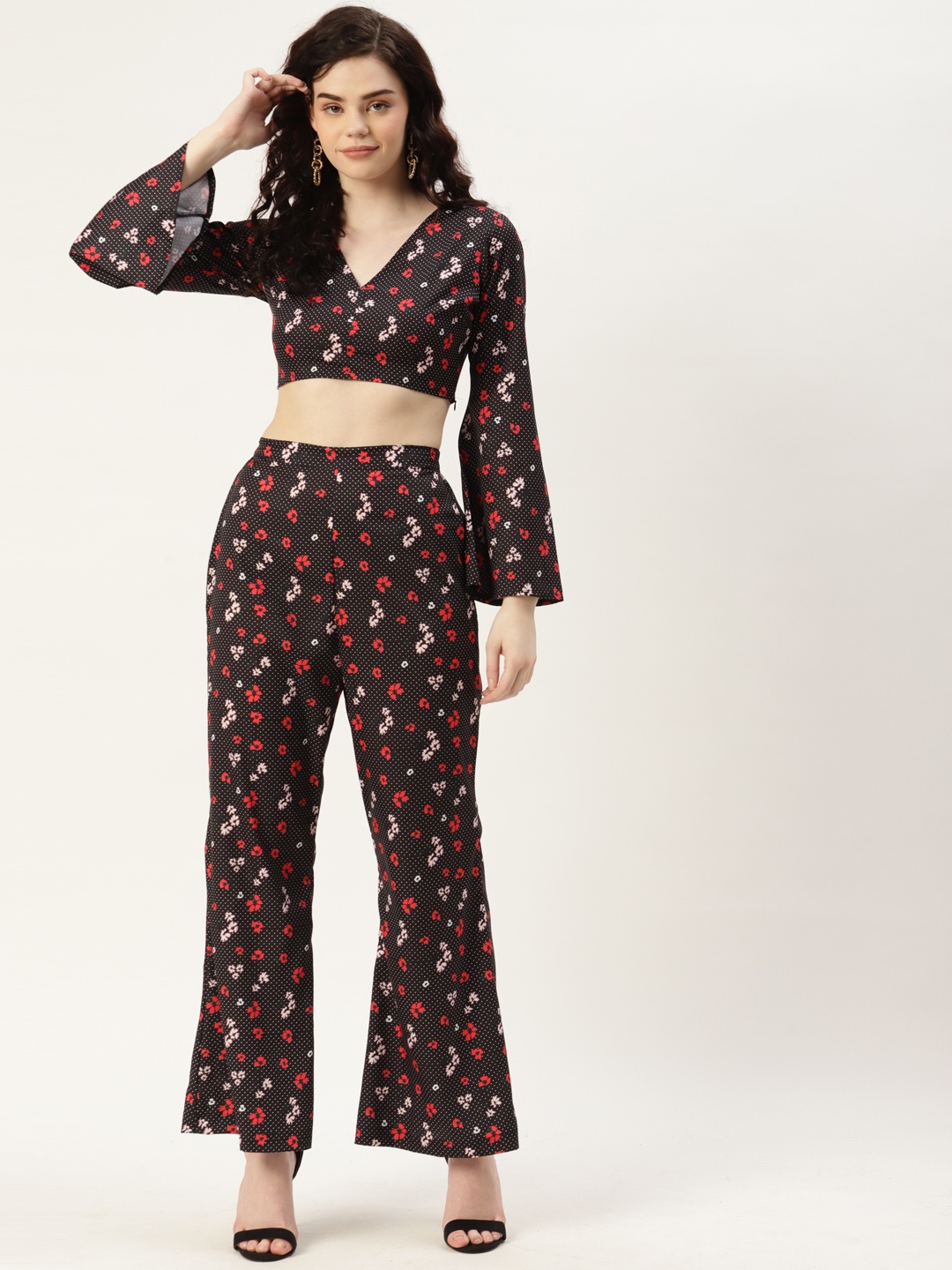 

Sleek Italia Women Black Floral Printed Top With Palazzos