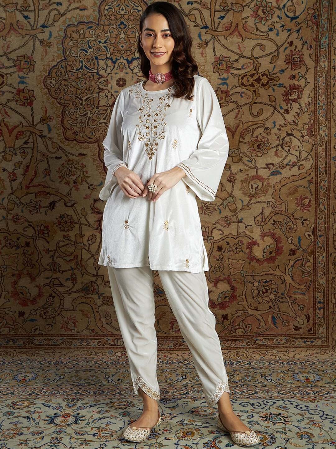 

Shae by SASSAFRAS Women White Floral Embroidered Velvet Kurta with Trouser