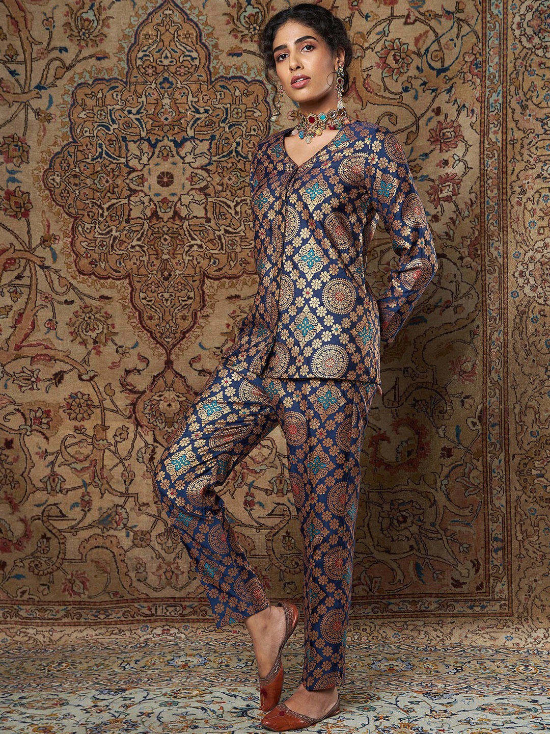 

Shae by SASSAFRAS Women Navy Blue Ethnic Motifs Printed Tapered Fit Trousers