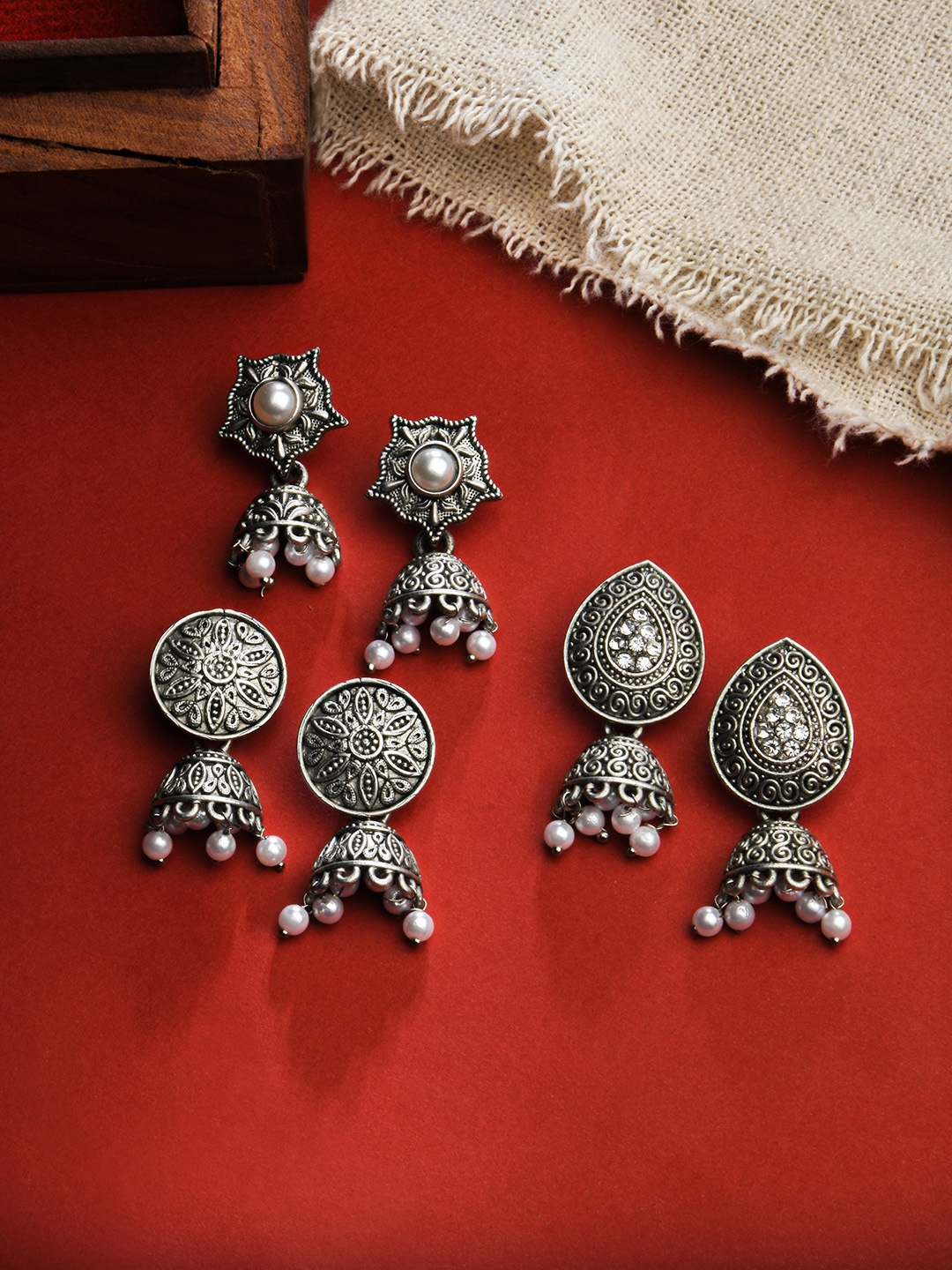 

Fida White Silver-Plated 3 Dome Shaped Jhumkas Earrings