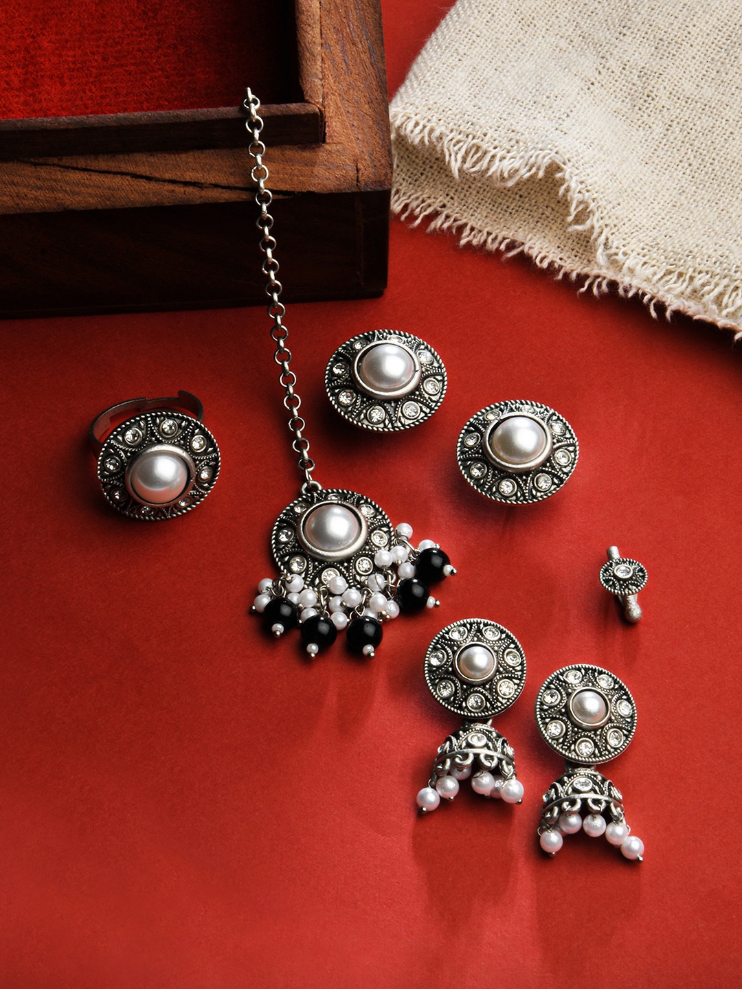 

Fida Black & White Silver-Plated Oxidized Artificial Stone And Pearl Studded Jewellery Set