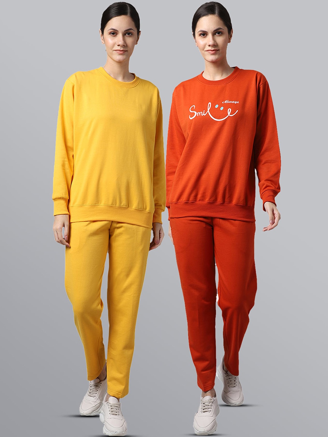 

VIMAL JONNEY Women Pack of 2 Yellow & Orange Printed Fleece Tracksuits