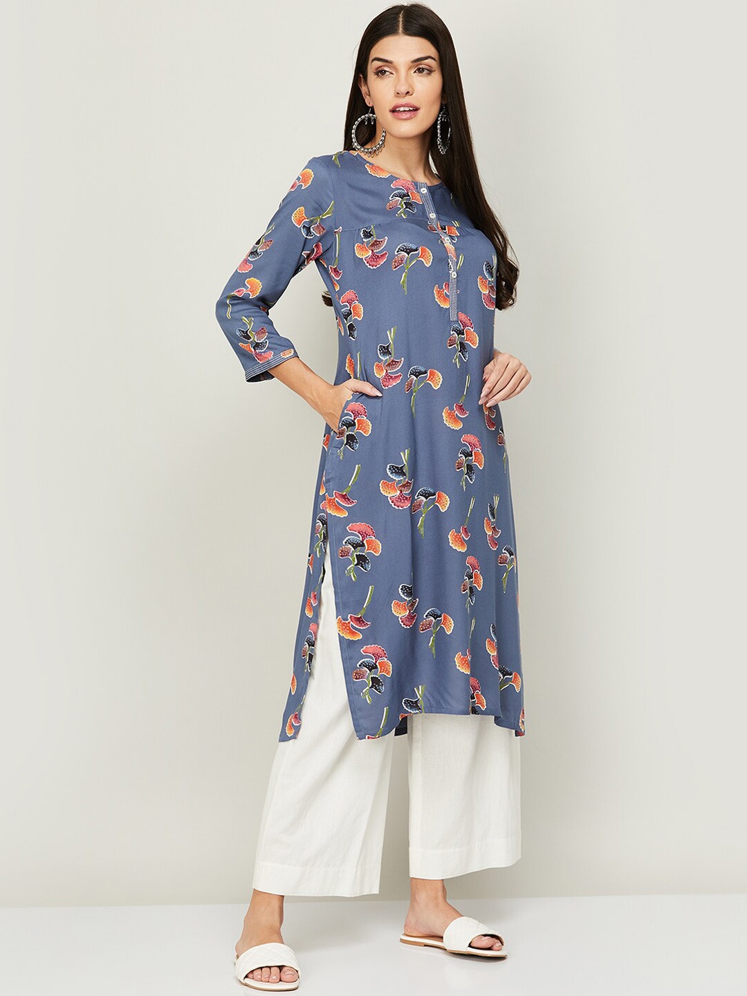 

Melange by Lifestyle Women Navy Blue & Orange Floral Printed Kurta