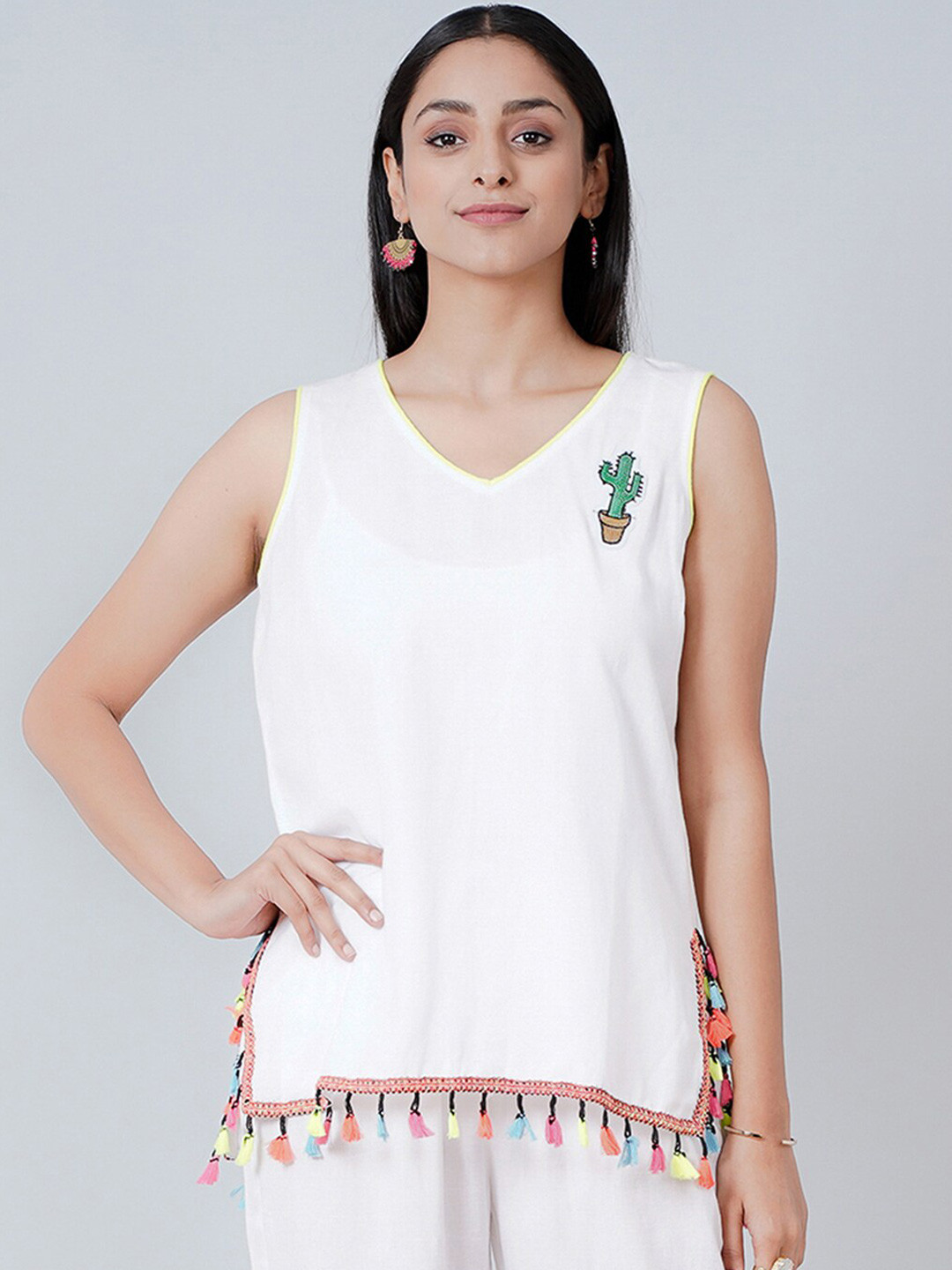 

First Resort by Ramola Bachchan Women White Solid V-Neck Sleeveless Top