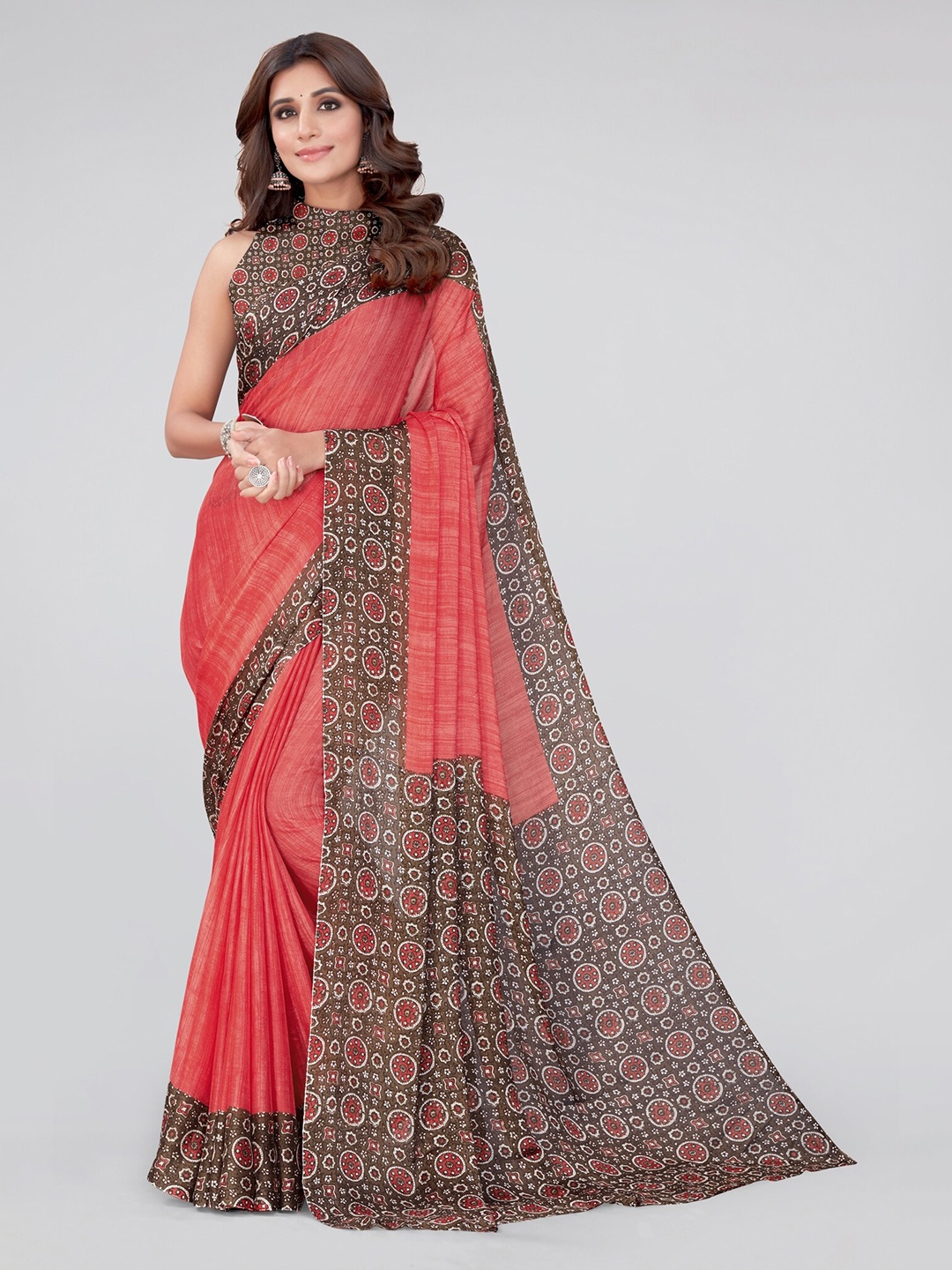 

MIRCHI FASHION Coral & White Ethnic Motifs Printed Saree