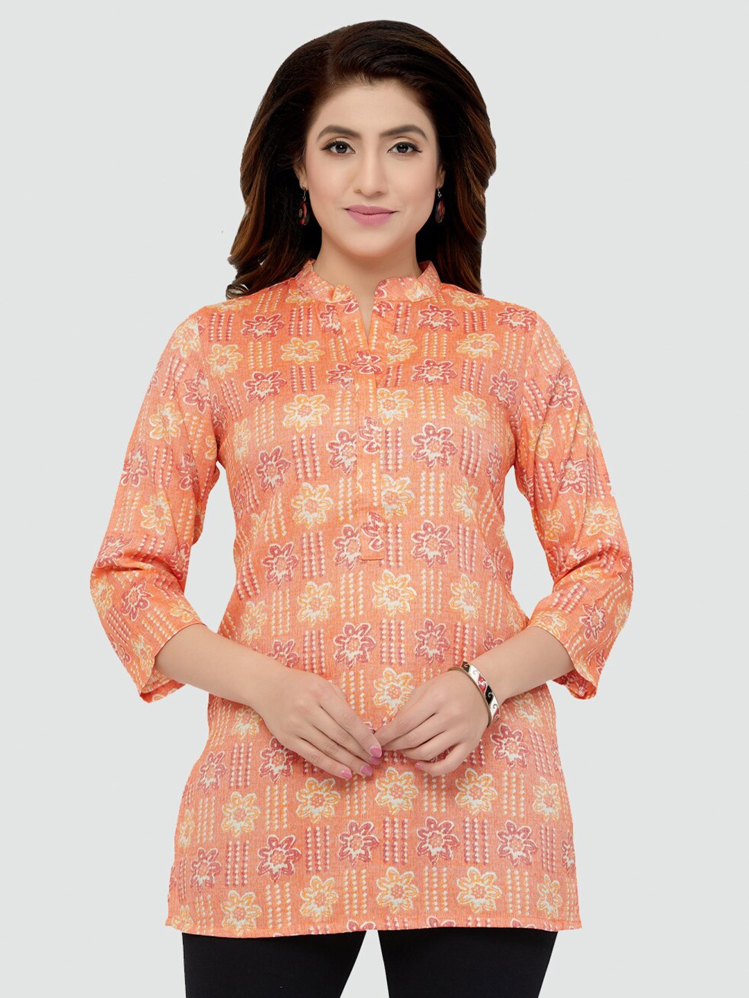 

Saree Swarg Orange Floral Printed Kurti