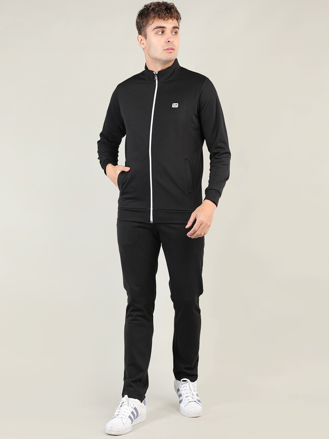 

NEVA Men Black Solid Tracksuits