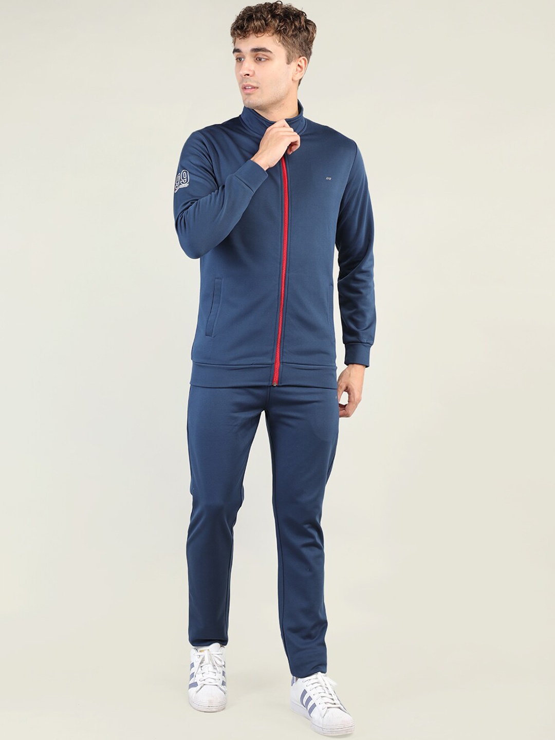 

NEVA Men Navy Blue Solid Sports Tracksuits