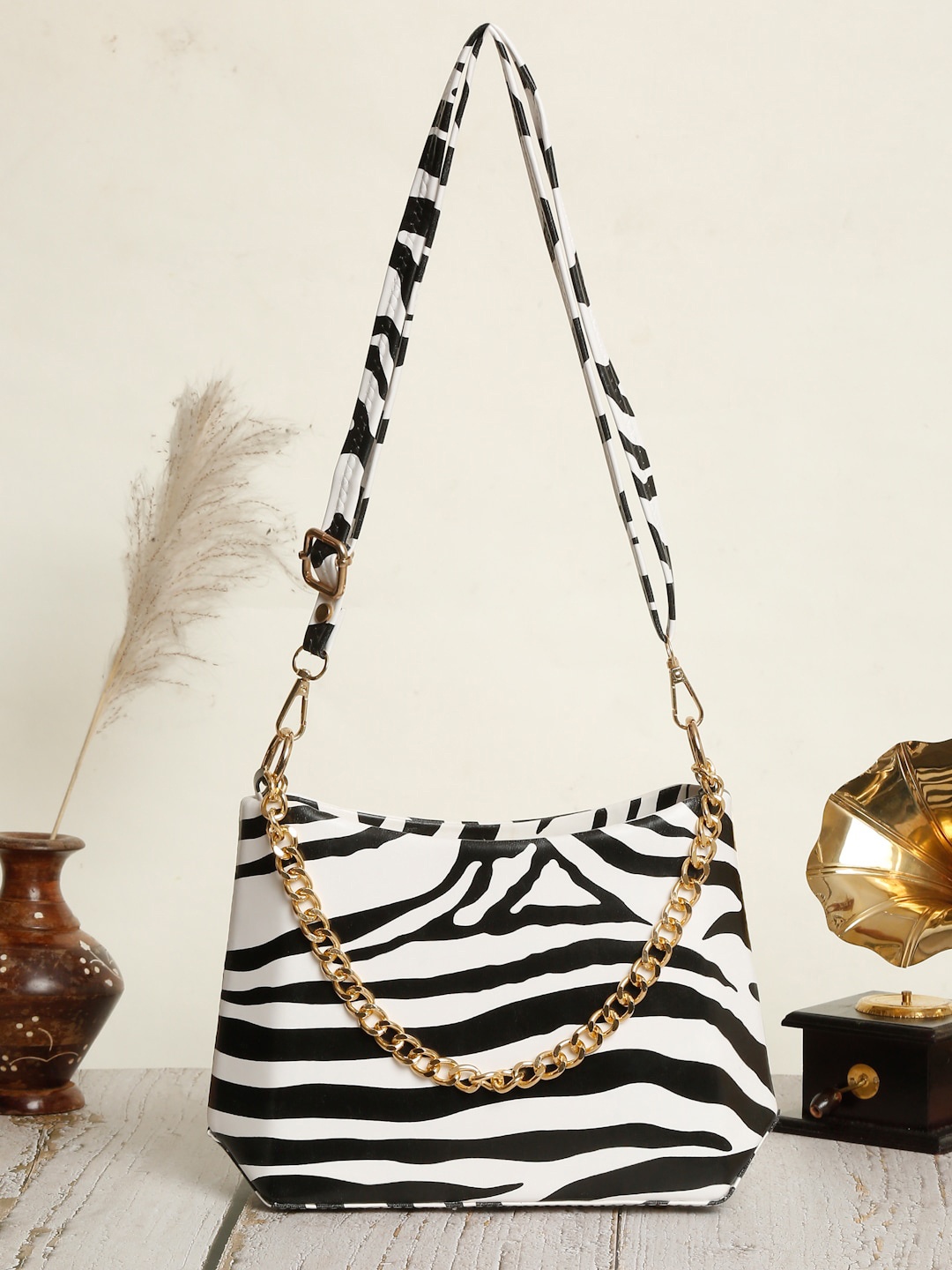 

Apsis Women Black & White Animal Printed Sling Bag