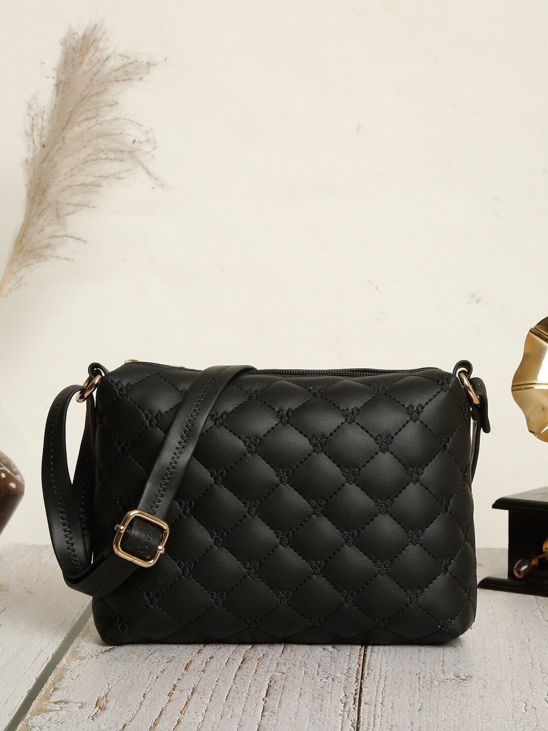 

Apsis Women Black Textured Structured Sling Bag with Quilted