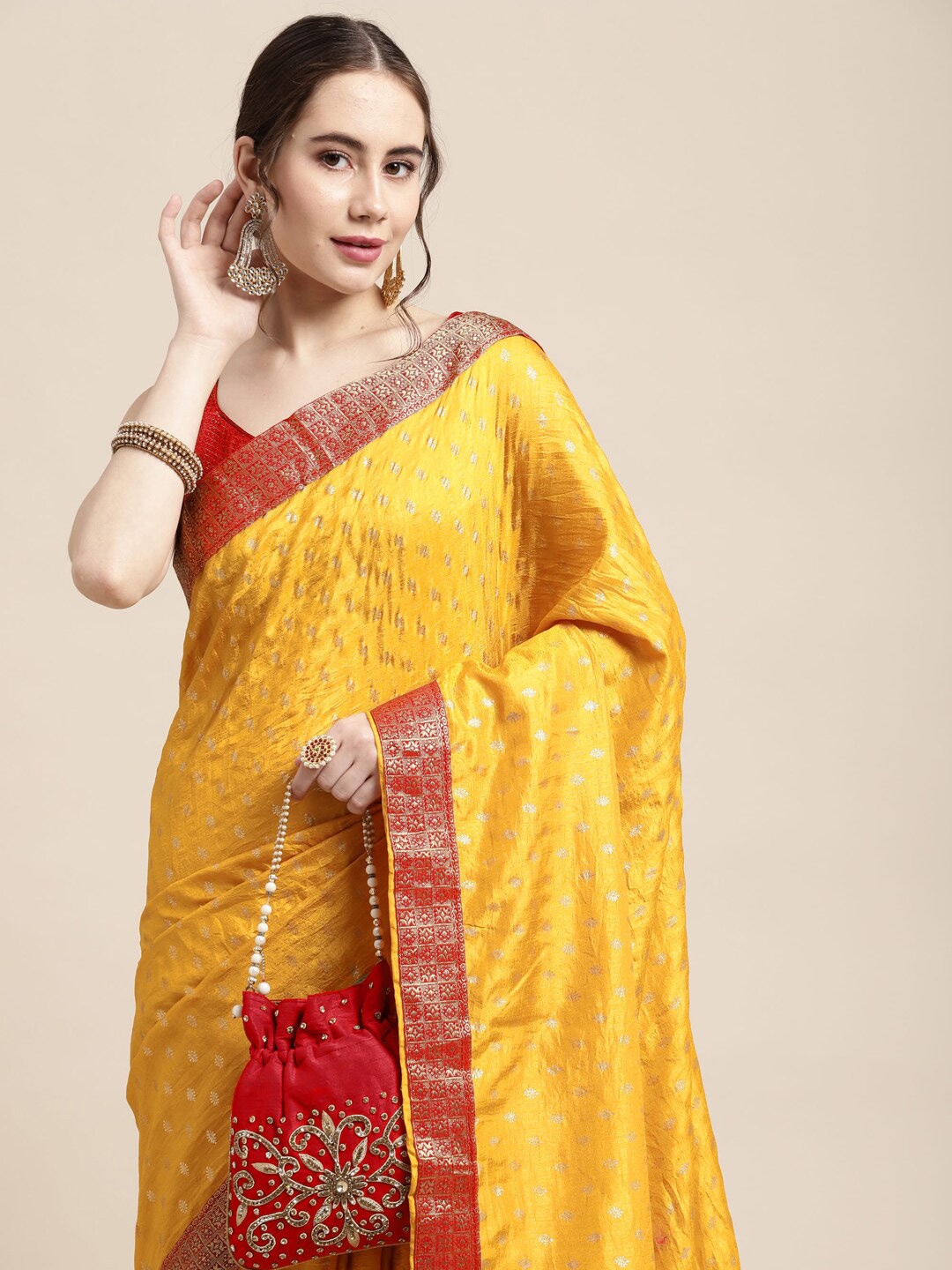 

Satrani Yellow & Red Ethnic Motifs Zari Silk Blend Saree