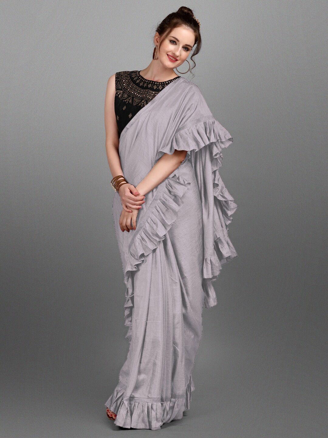 

Ethnic Junction Grey Solid Silk Blend Ruffles Saree