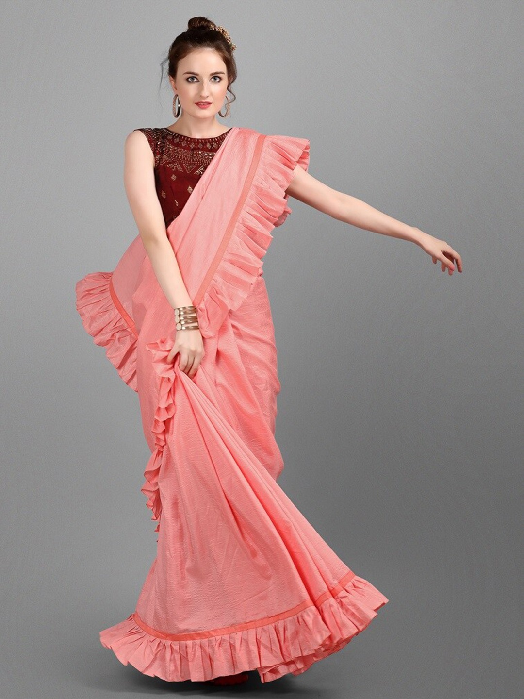 

Ethnic Junction Pink Solid Silk Blend Ruffles Saree