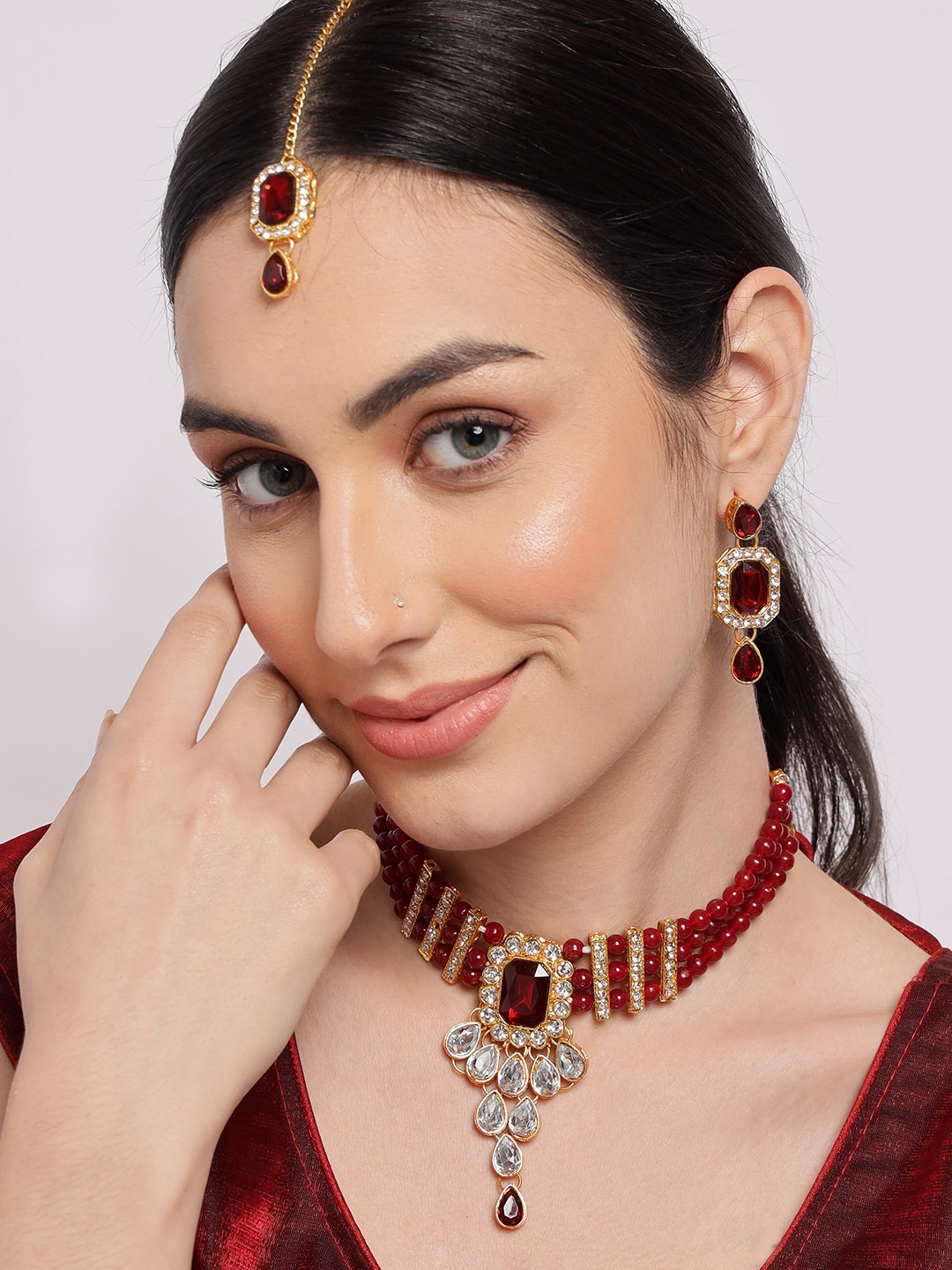 

SOHI Red Gold-Plated Stone-Studded & Beaded Jewellery Set