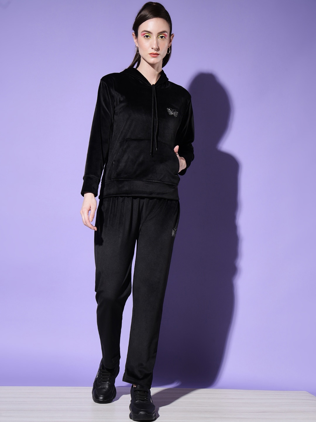 

BUY NEW TREND Women Black Solid Tracksuits