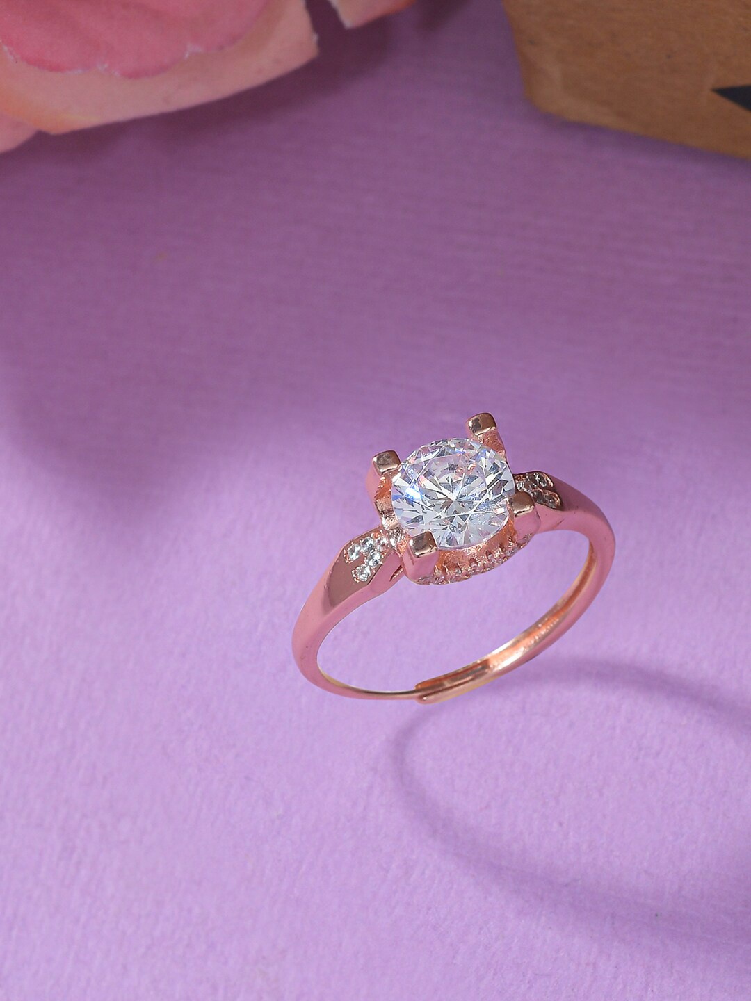 

Voylla Women Four Prong Round Cut White CZ Stone Studded Rose Gold-Plated Ring