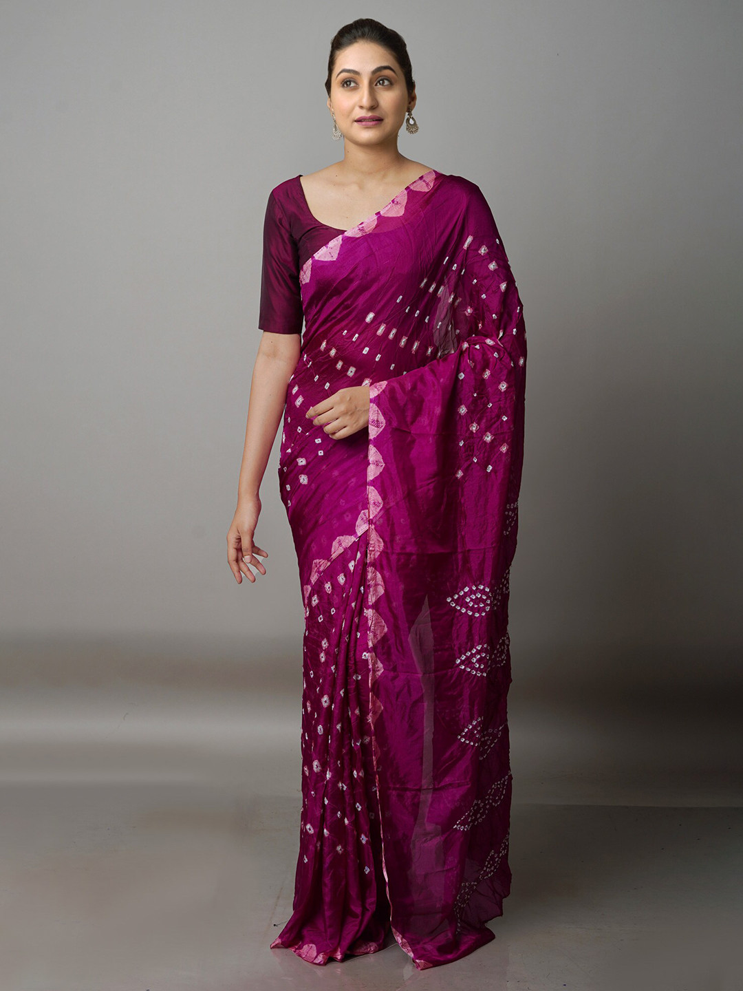 

Unnati Silks Purple & White Bandhani Silk Blend Bandhani Saree