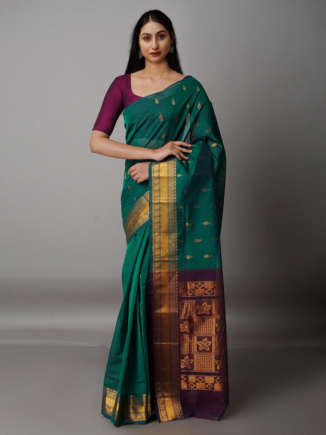 

Unnati Silks Green & Purple Woven Design Zari Pure Cotton Gadwal Saree