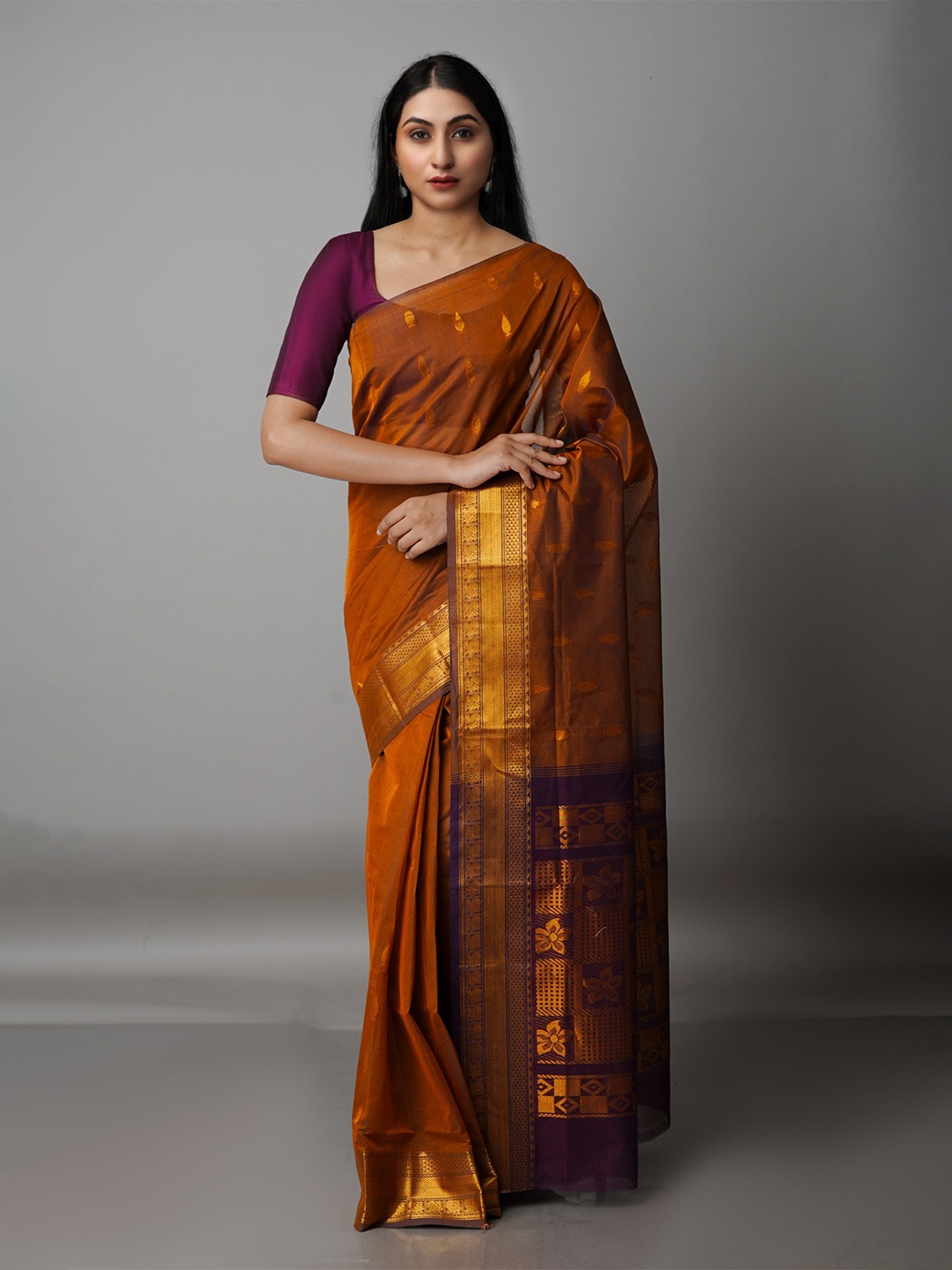 

Unnati Silks Orange & Brown Woven Design Zari Pure Cotton Gadwal Saree