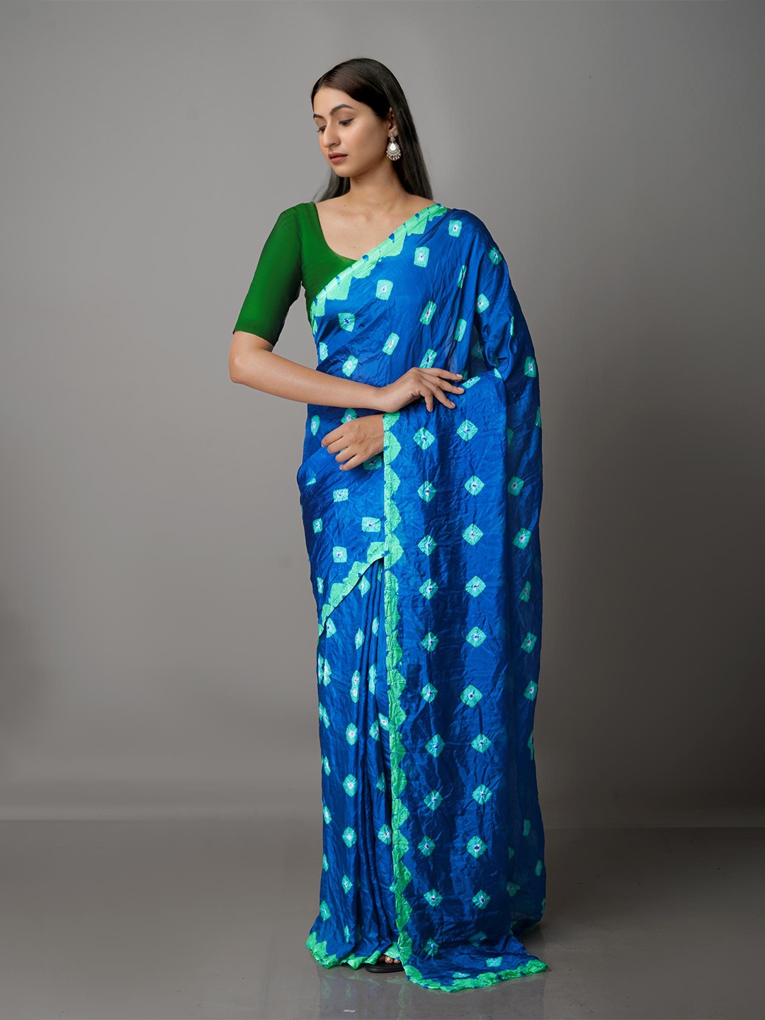 

Unnati Silks Blue & White Bandhani Silk Blend Bandhani Saree