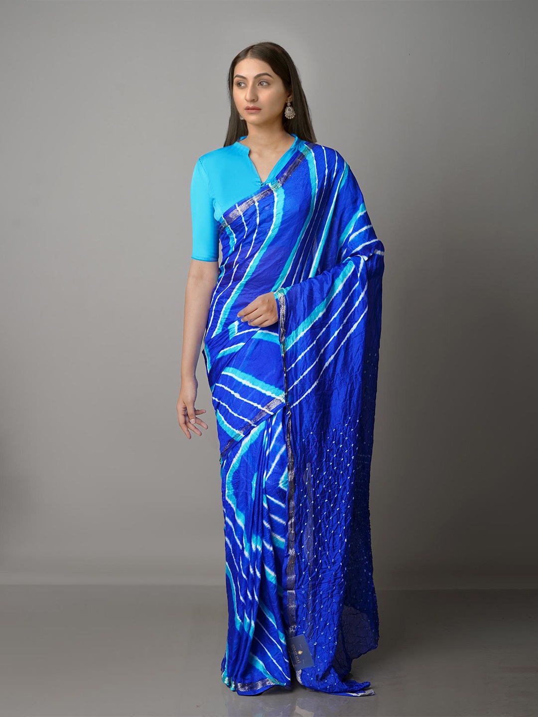 

Unnati Silks Blue & White Bandhani Silk Blend Bandhani Saree