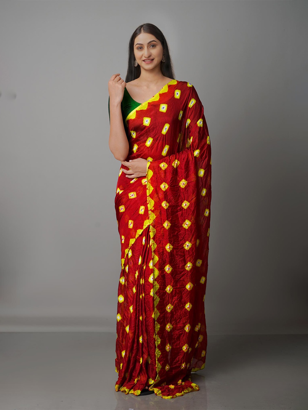 

Unnati Silks Maroon & Yellow Bandhani Silk Blend Bandhani Saree