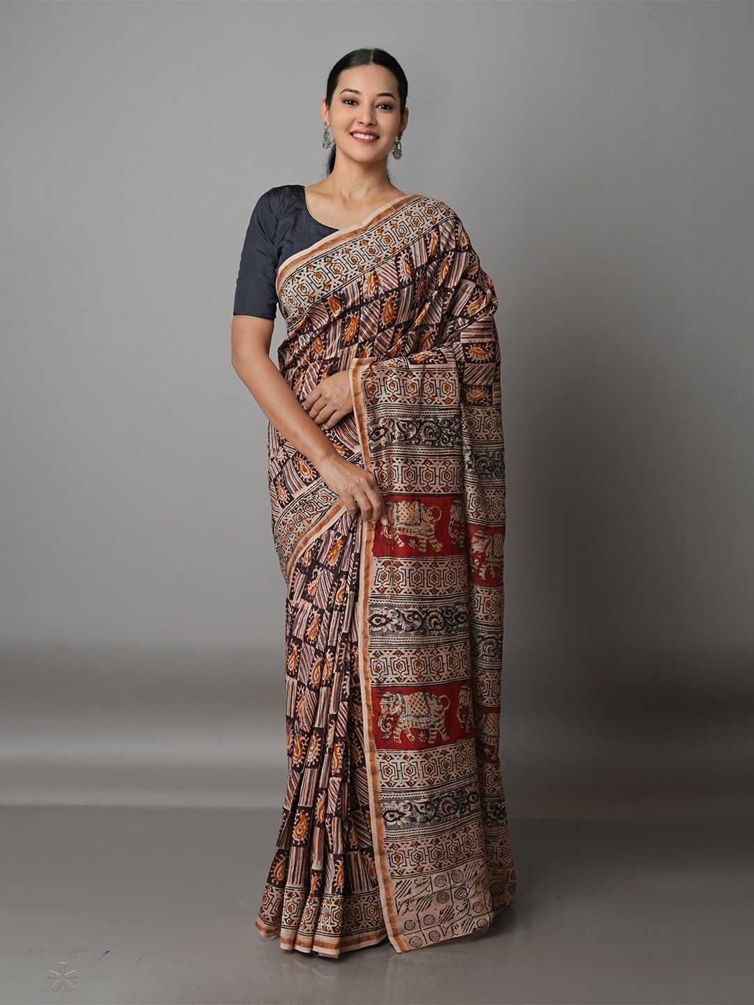 

Unnati Silks Brown & Maroon Ethnic Motifs Zari Silk Cotton Chanderi Saree