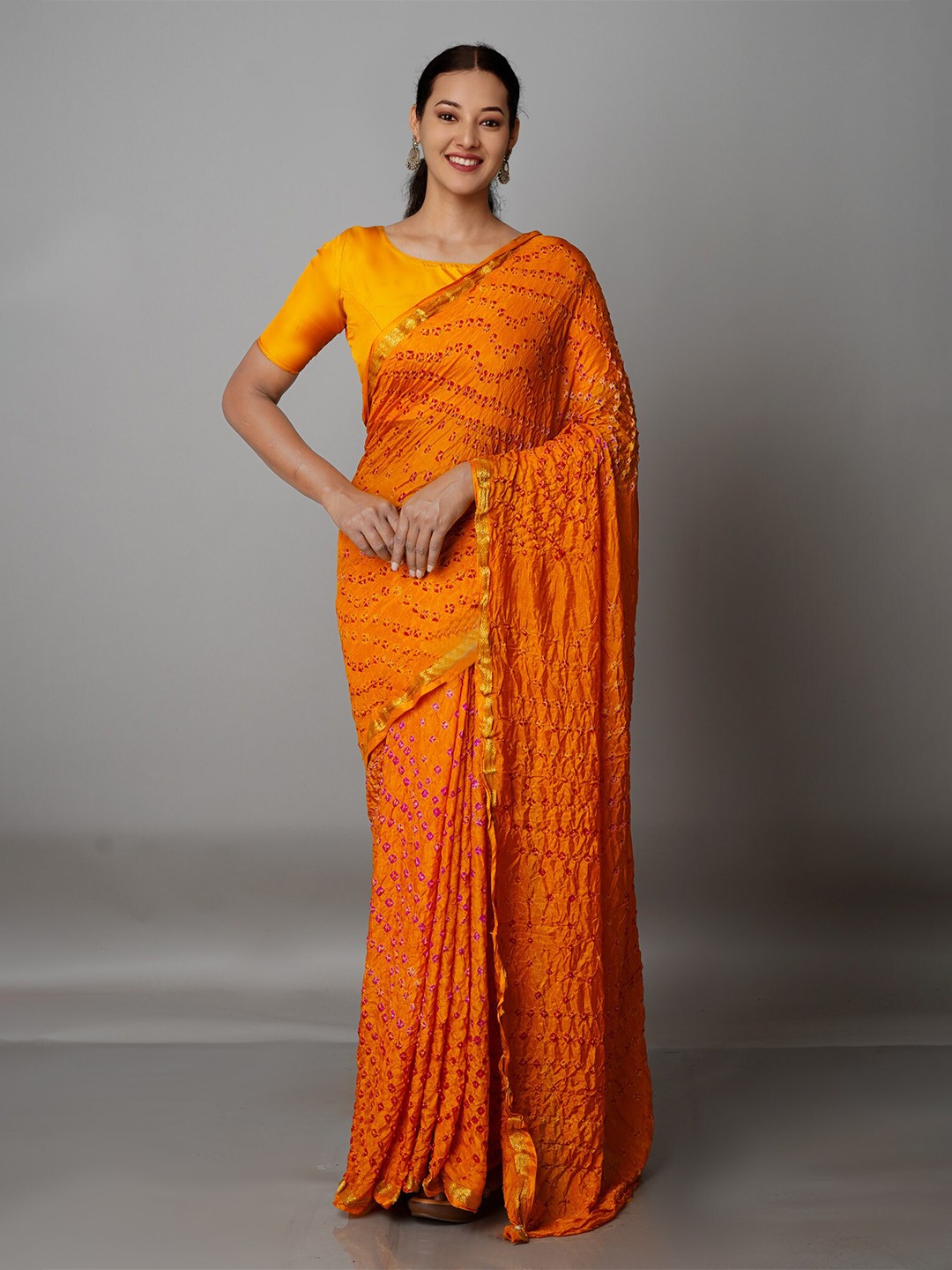 

Unnati Silks Yellow & Pink Bandhani Silk Blend Bandhani Saree