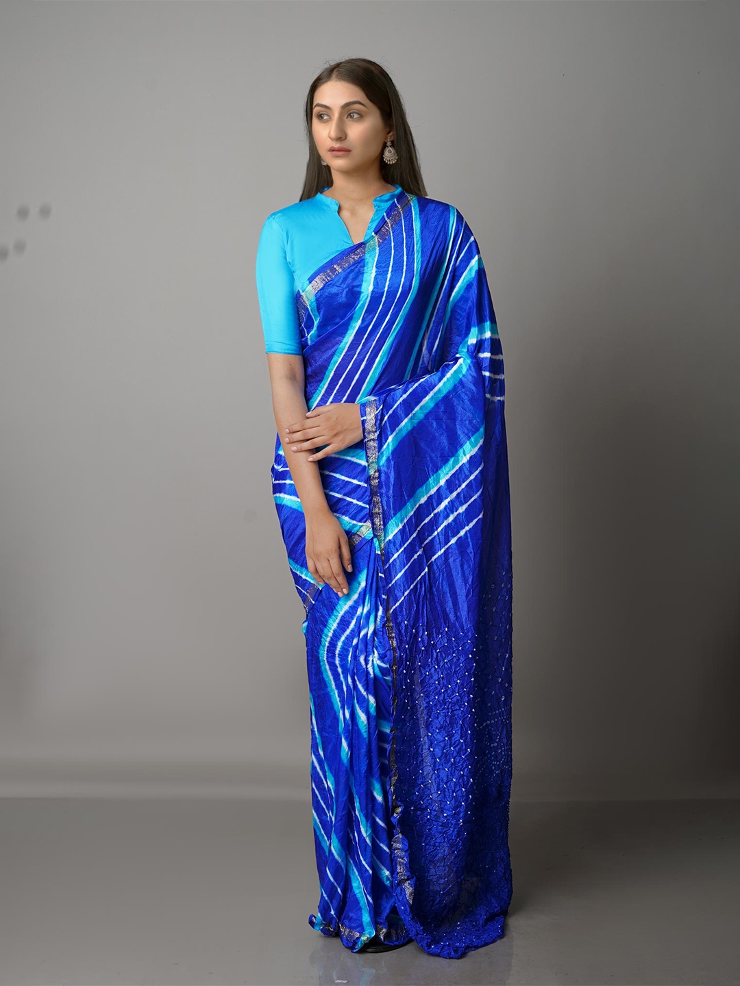 

Unnati Silks Blue & White Silk Blend Bandhani Saree