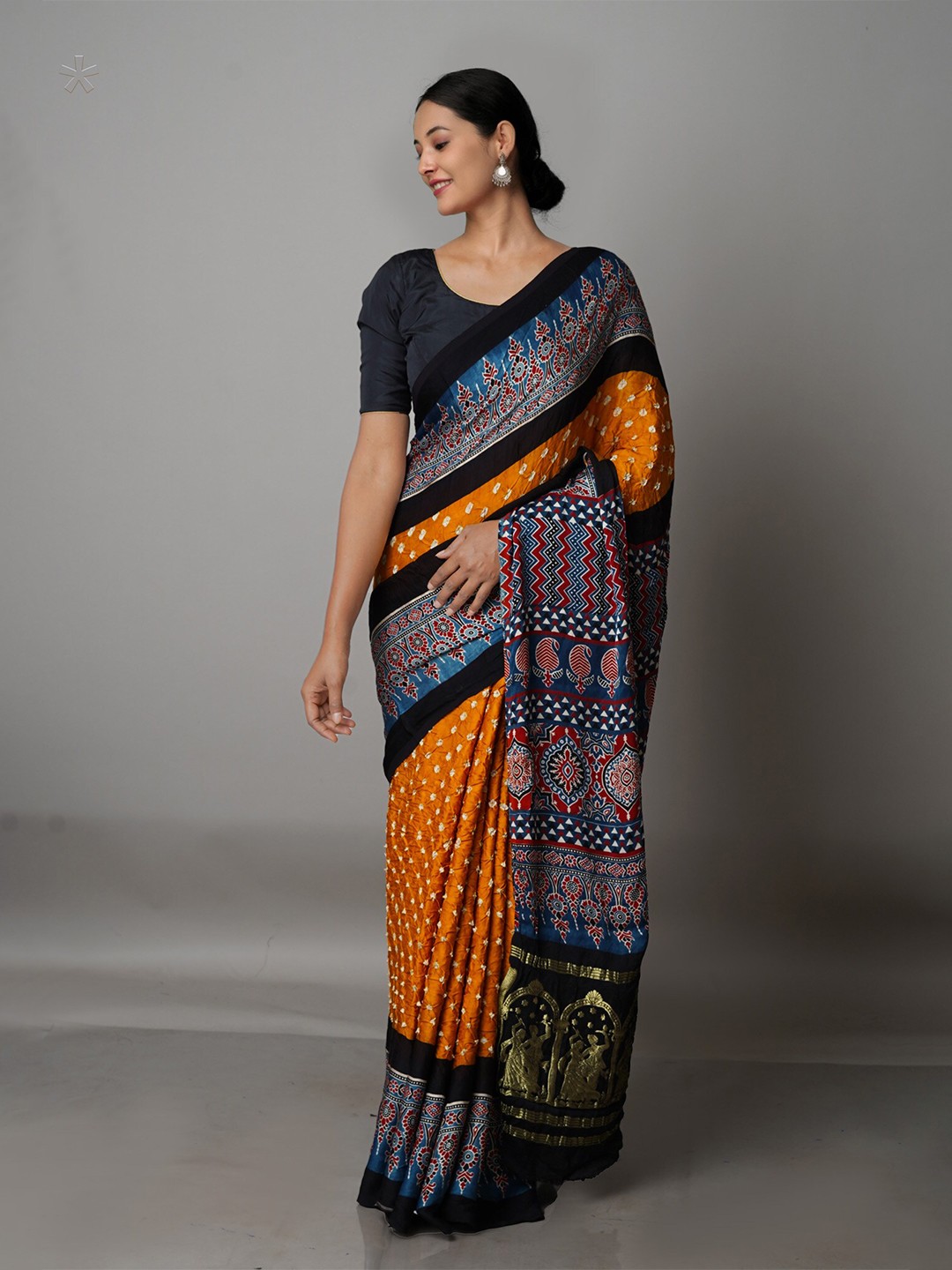 

Unnati Silks Yellow & Blue Silk Blend Bandhani Saree