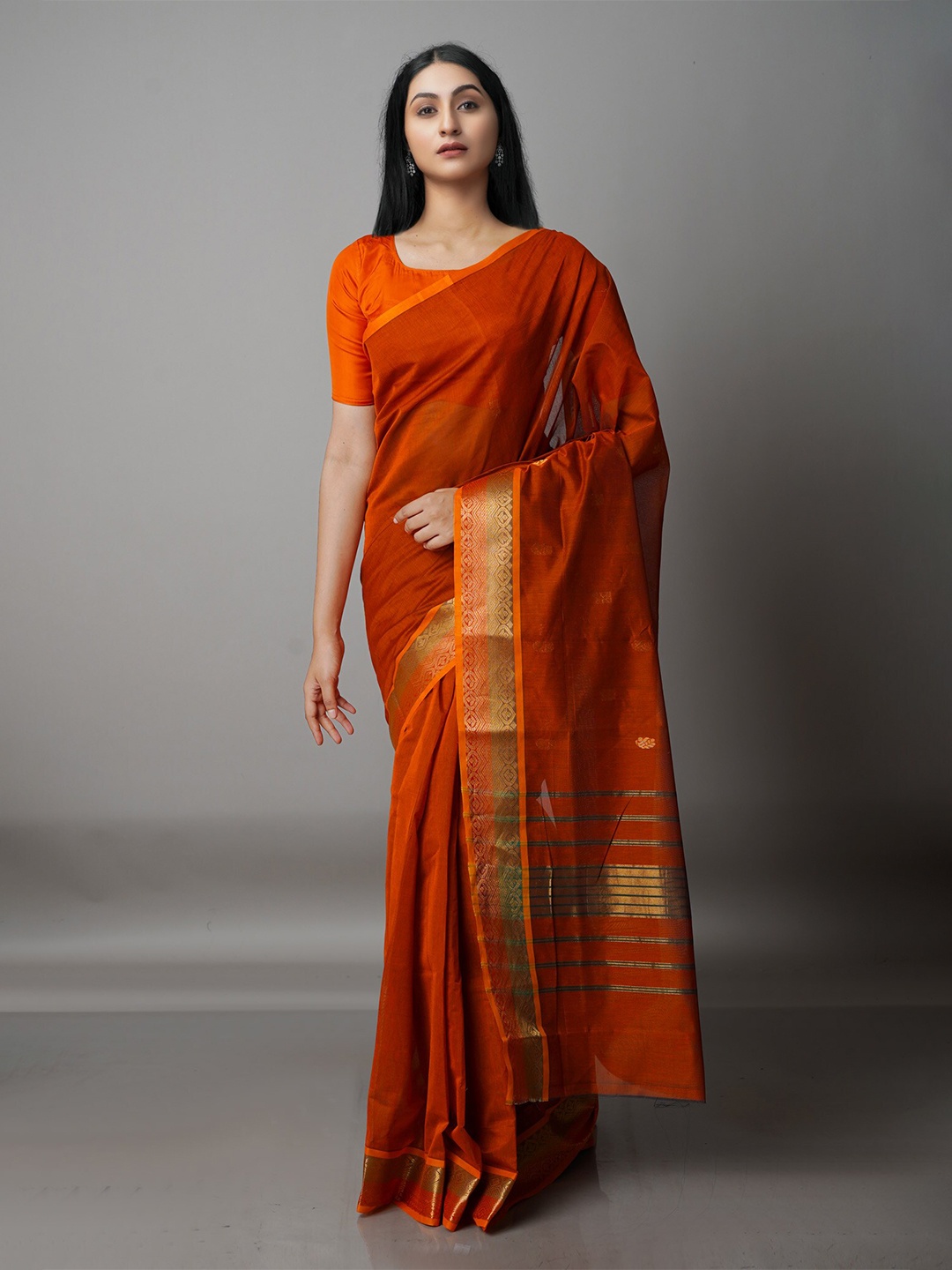 

Unnati Silks Orange & Gold-Toned Zari Pure Cotton Handloom Gadwal Saree