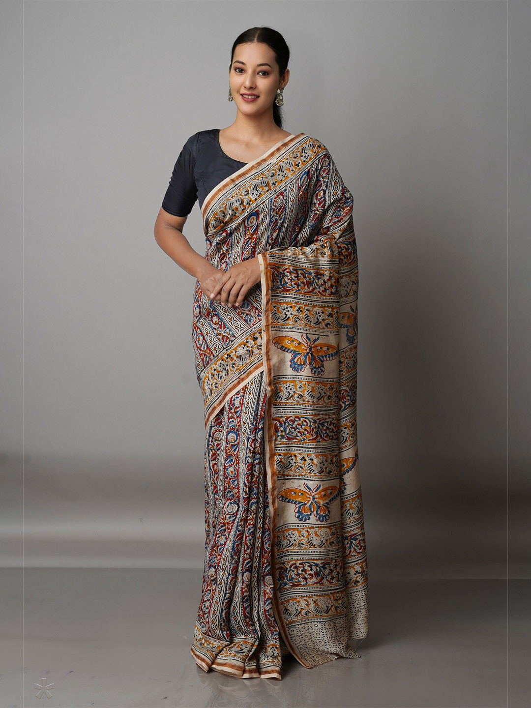 

Unnati Silks Grey & Orange Kalamkari Silk Cotton Chanderi Saree