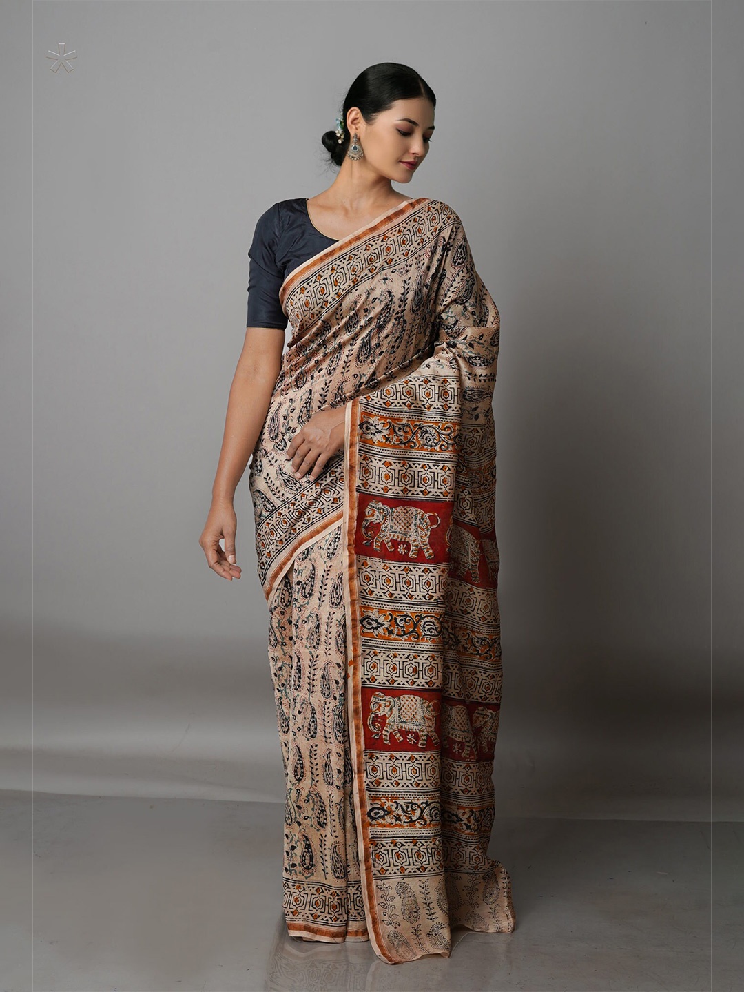 

Unnati Silks Beige & Red Kalamkari Silk Cotton Chanderi Saree