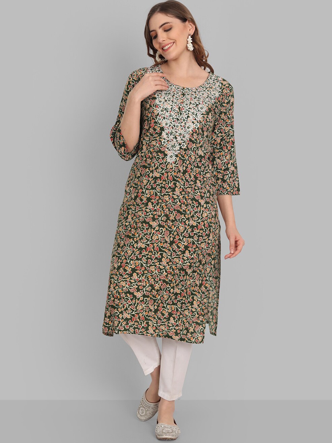 

SINGNI Women Green Ethnic Motifs Embroidered Thread Work Kurta with Trousers